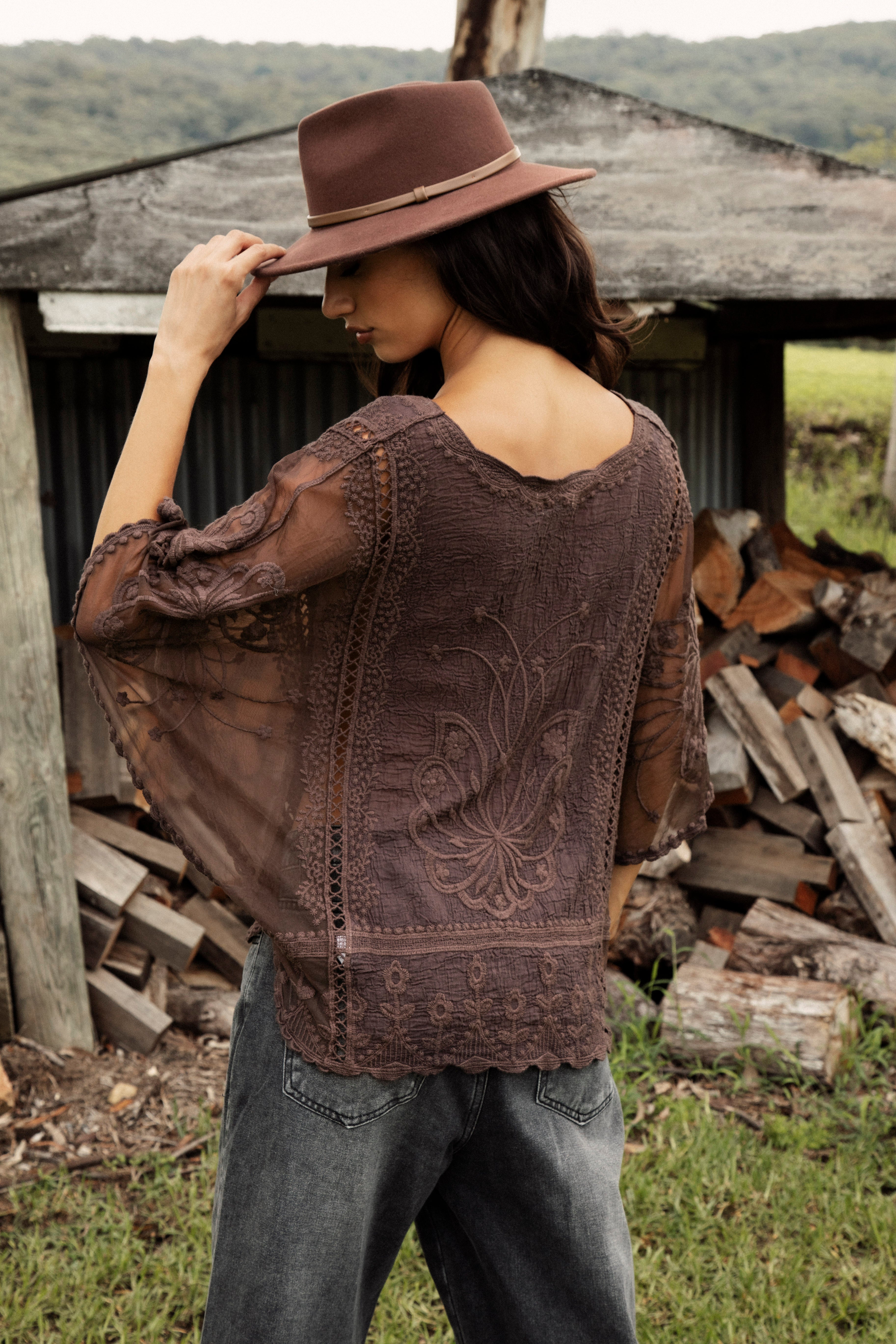 Faye Lace Top Mahogany showcasing sheer lace detail on sleeve.