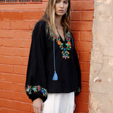 Flower Power Embroidered long sleeve top in black colurway with bright floral embroidery at bodice and cuff