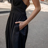 Gigi Jumpsuit Black - close up view showcasing pockets