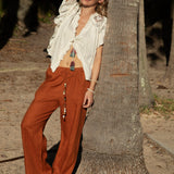 Gigi Pant Terracotta is crafted from rust coloured linen featuring a relaxed fit with elasticised waist 