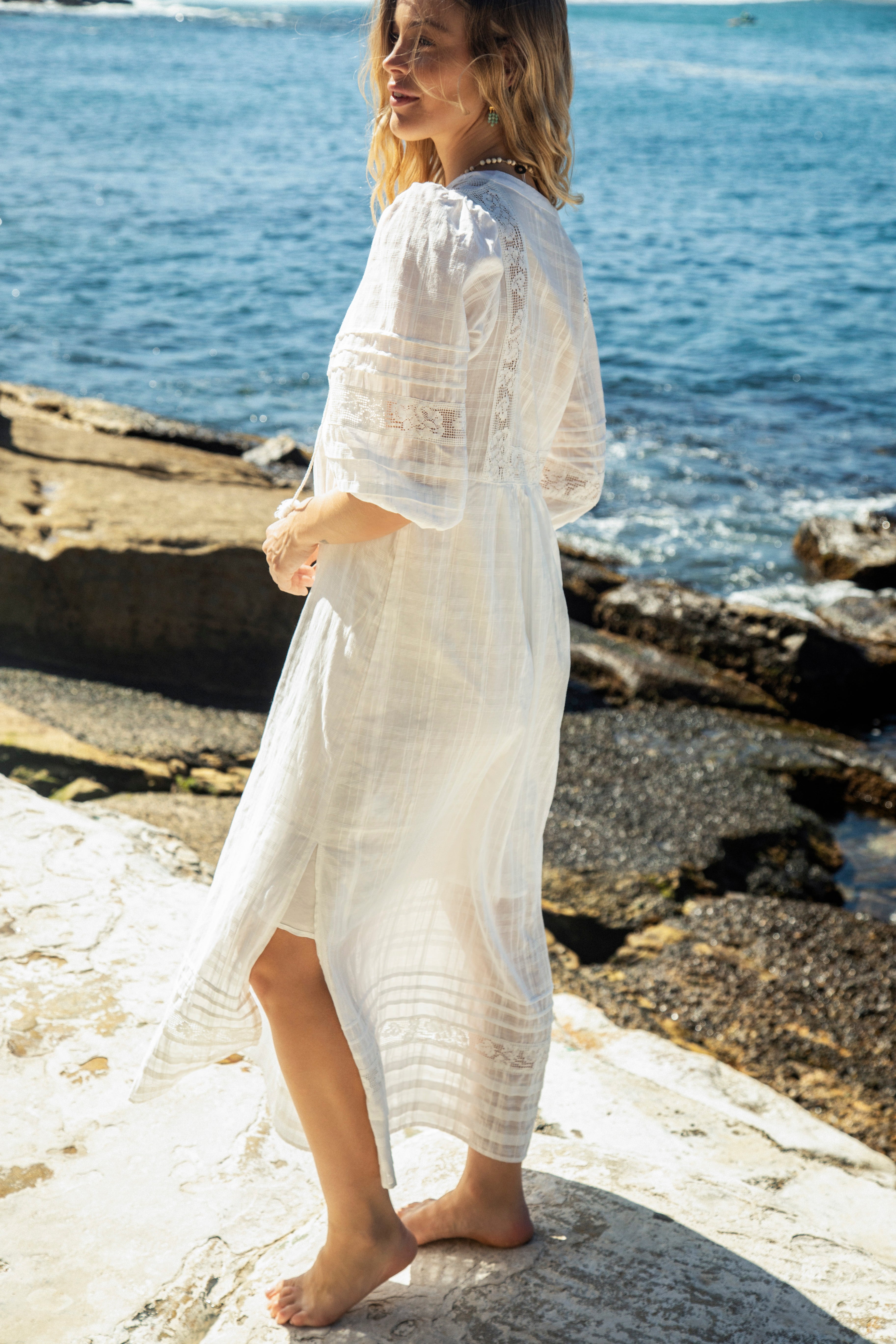 Glow Smock Dress side view showcasing maxi length and lace details