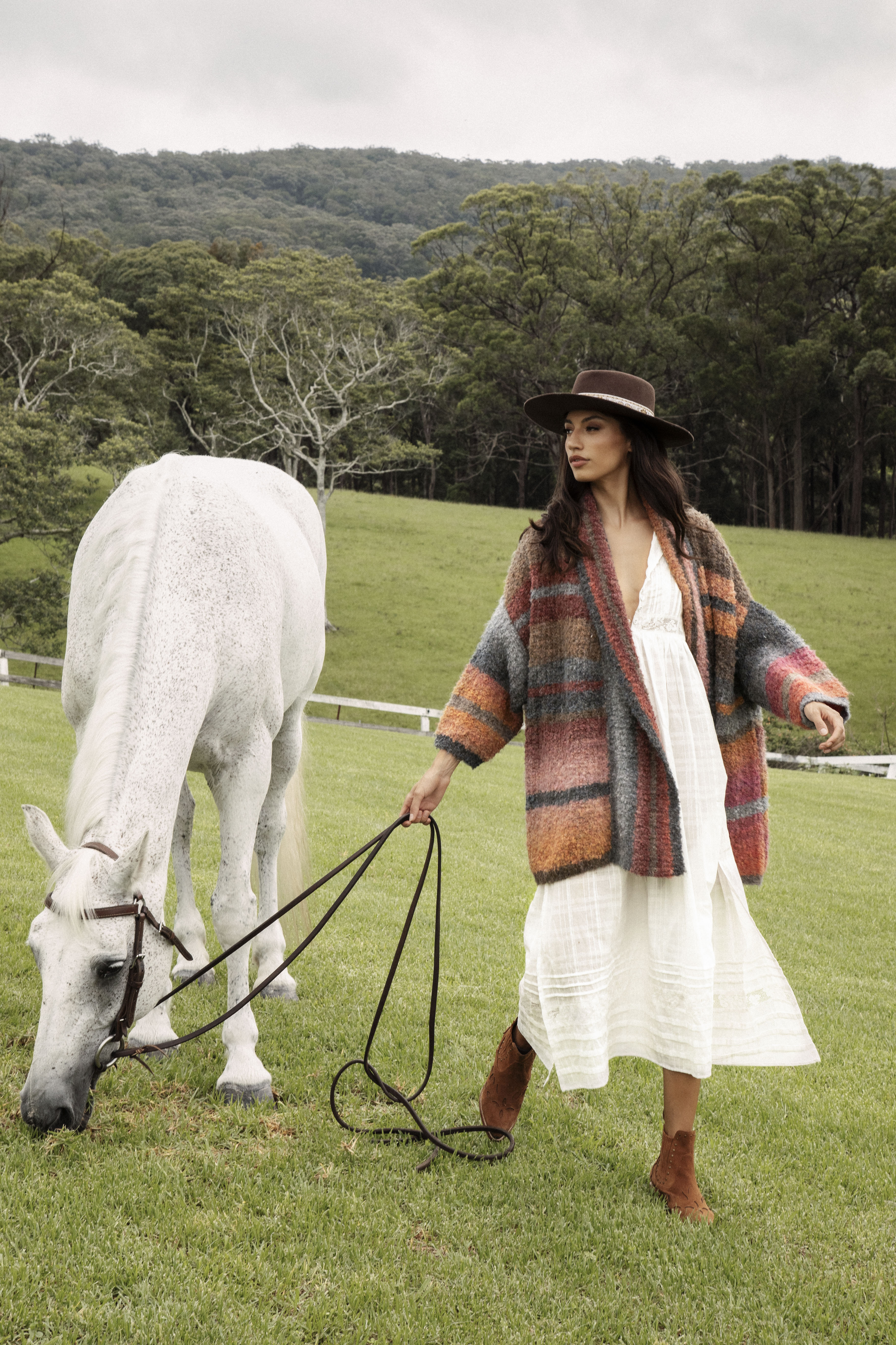 Harvest Slouch Cardigan worn with white midi dress, traveller boots and panama hat.