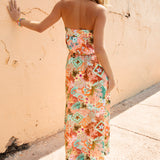 Havana Strapless Dress Tropicana - rear view showcasing vibrant tropical print. Worn with Nomad Sandals.