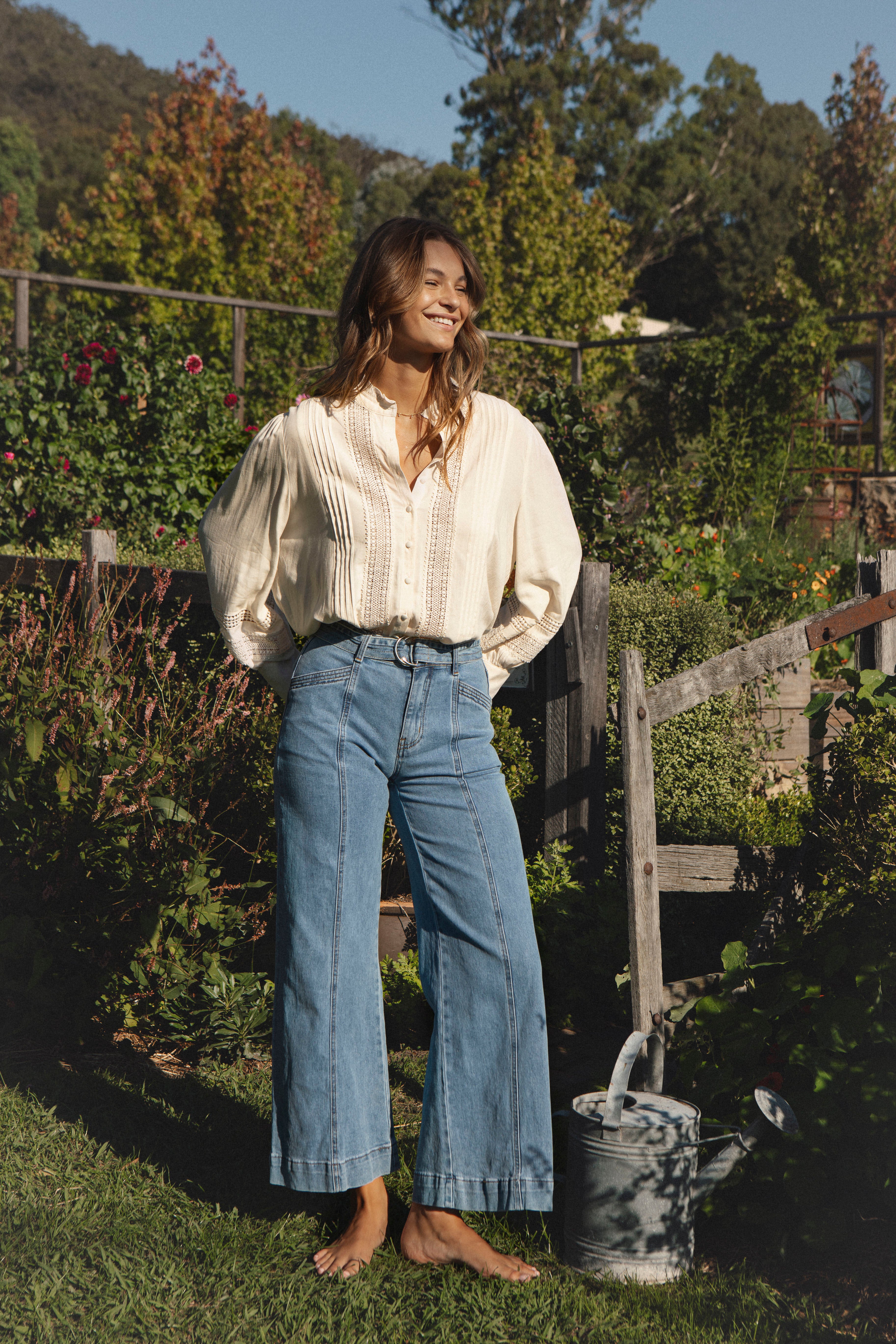 Hendrix Vintage Jean with bootleg cut and statement belt.