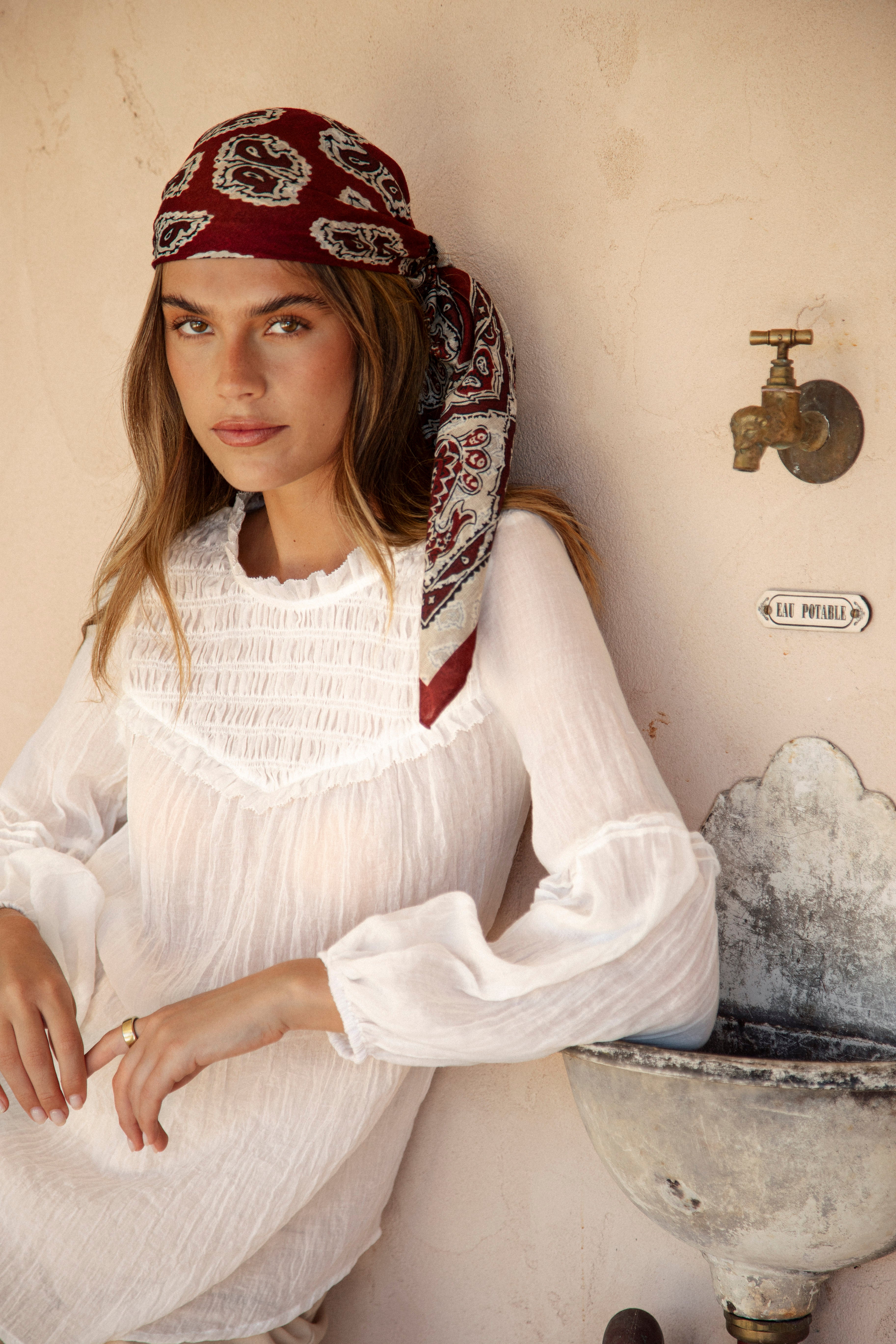 Italiano Scarf featuring burgundy colourway with paisley pattern in shades of beige and brown
