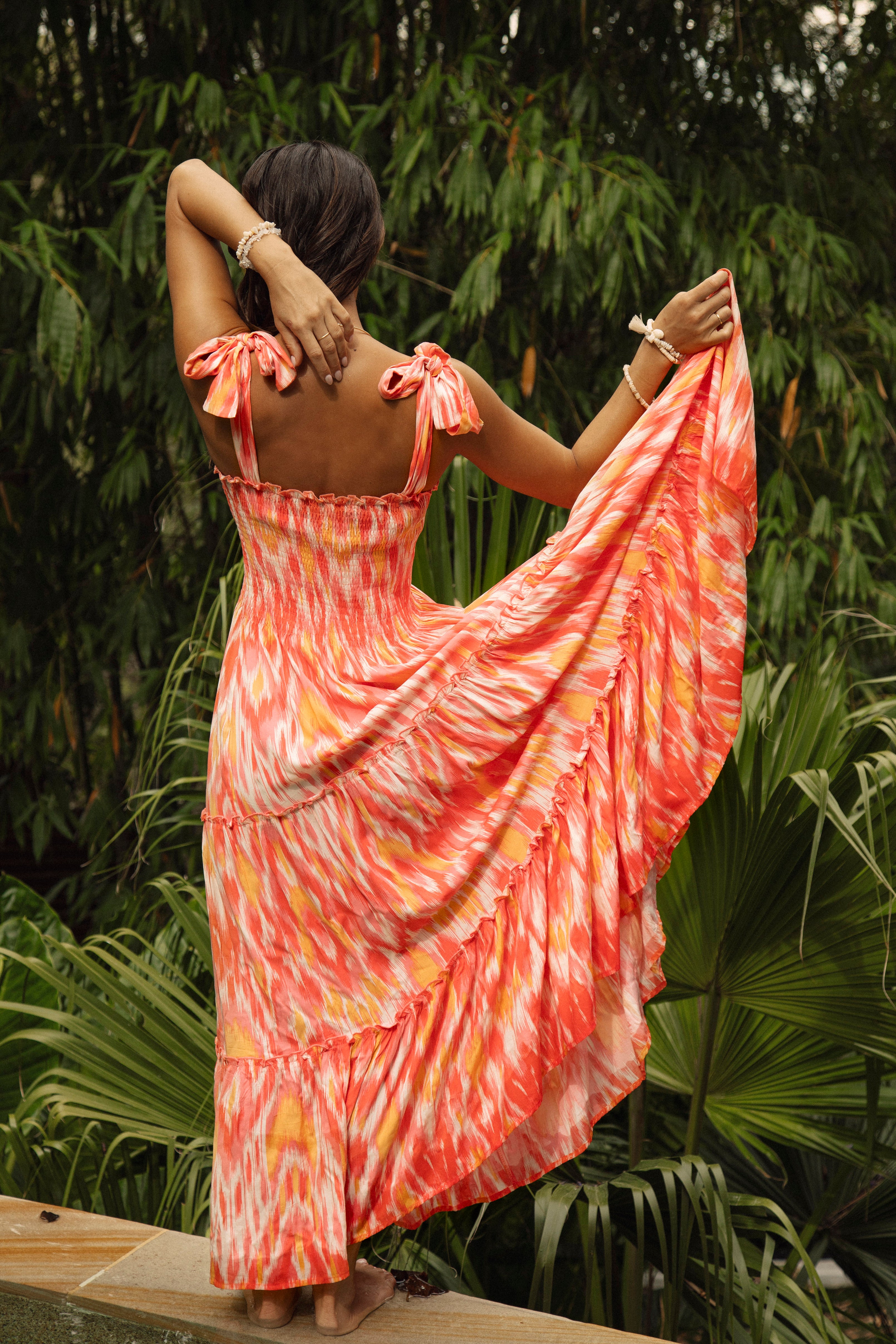 Kaia Maxi Sunburst - rear view showcasing tiered maxi skirt