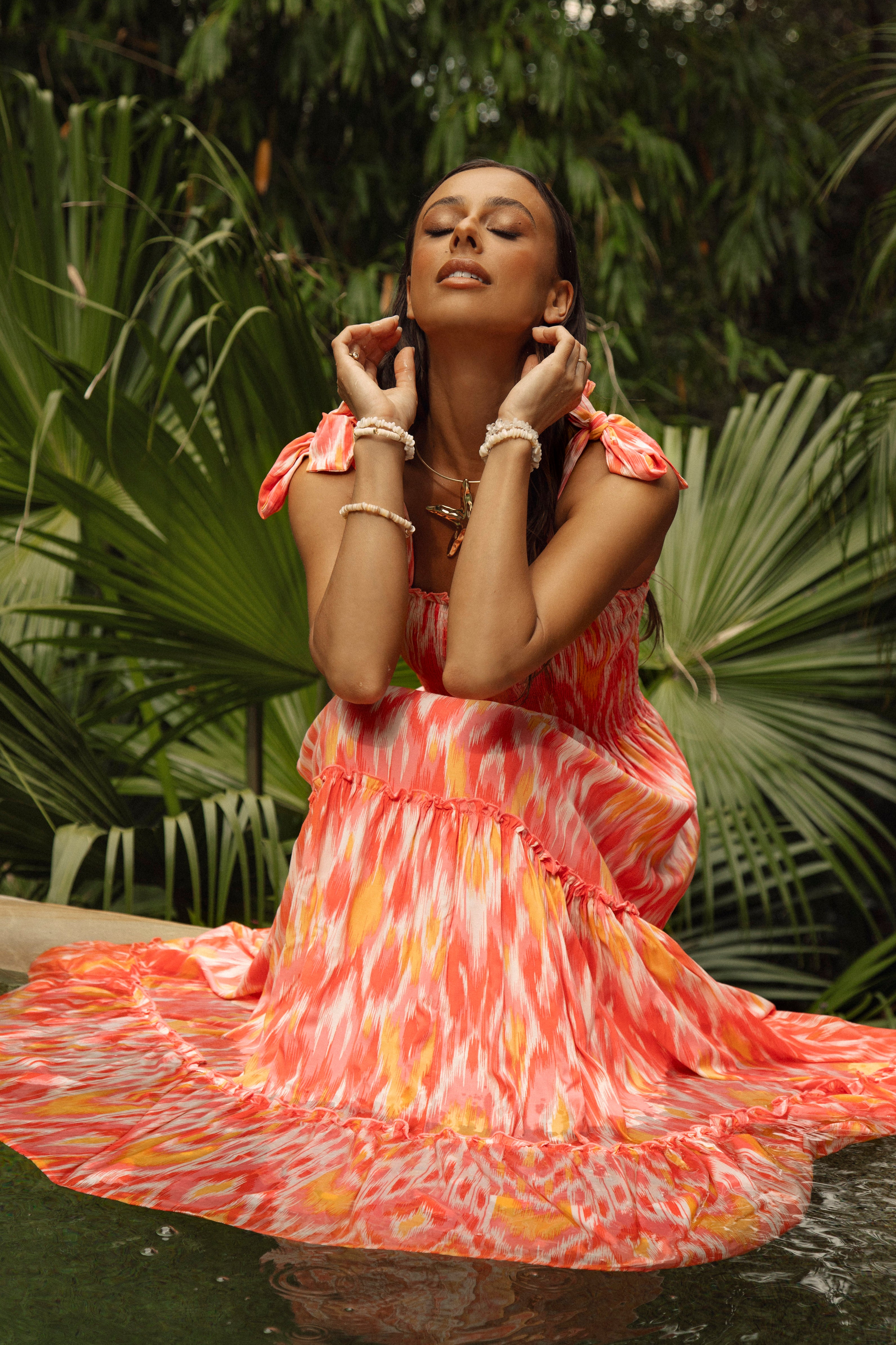 Kaia Maxi Sunburst Boho style maxi dress featuring Ikat pattern in shades of orange and yellow