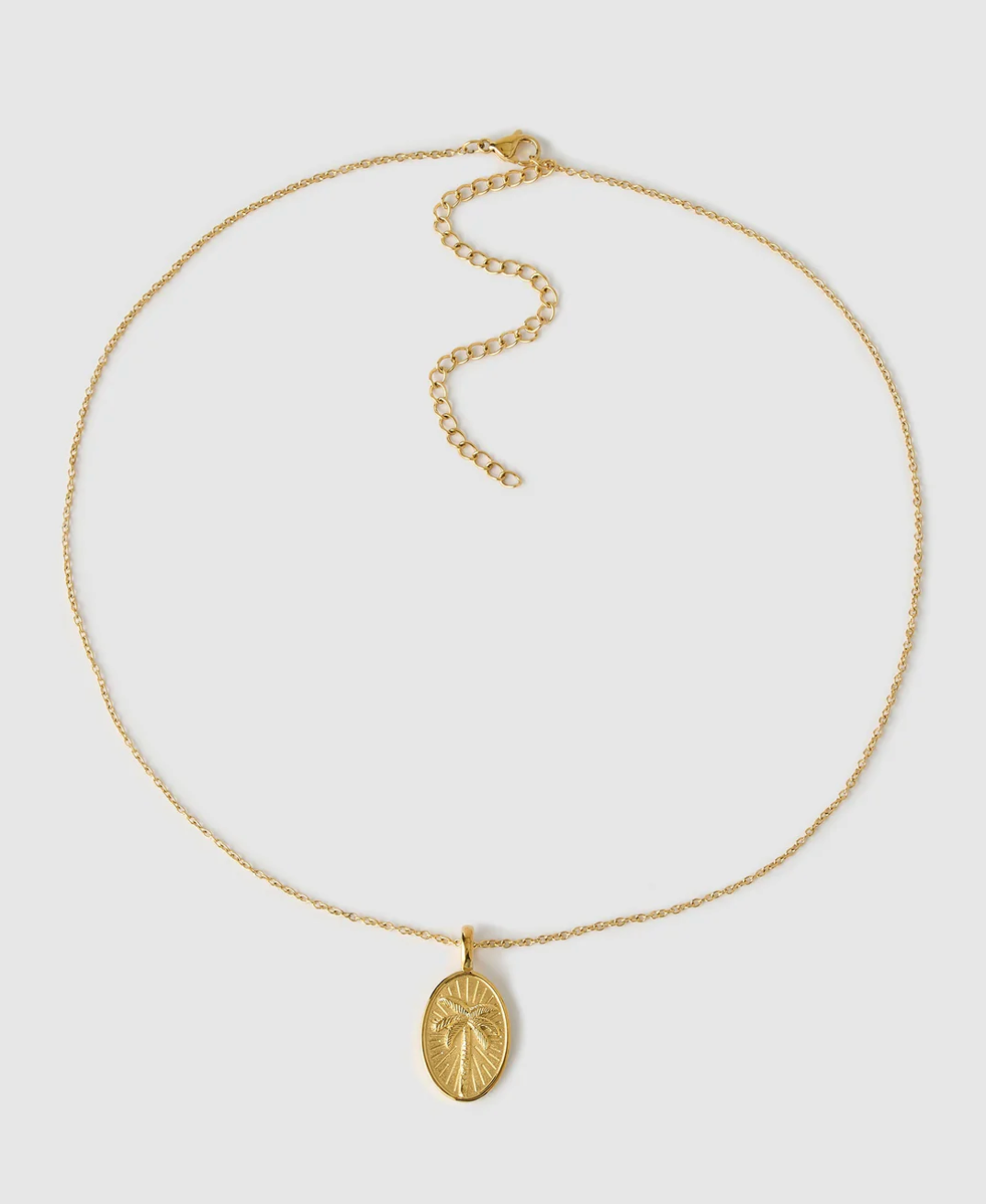 La Palma Gold Necklace showcasing pendant with palm tree motif