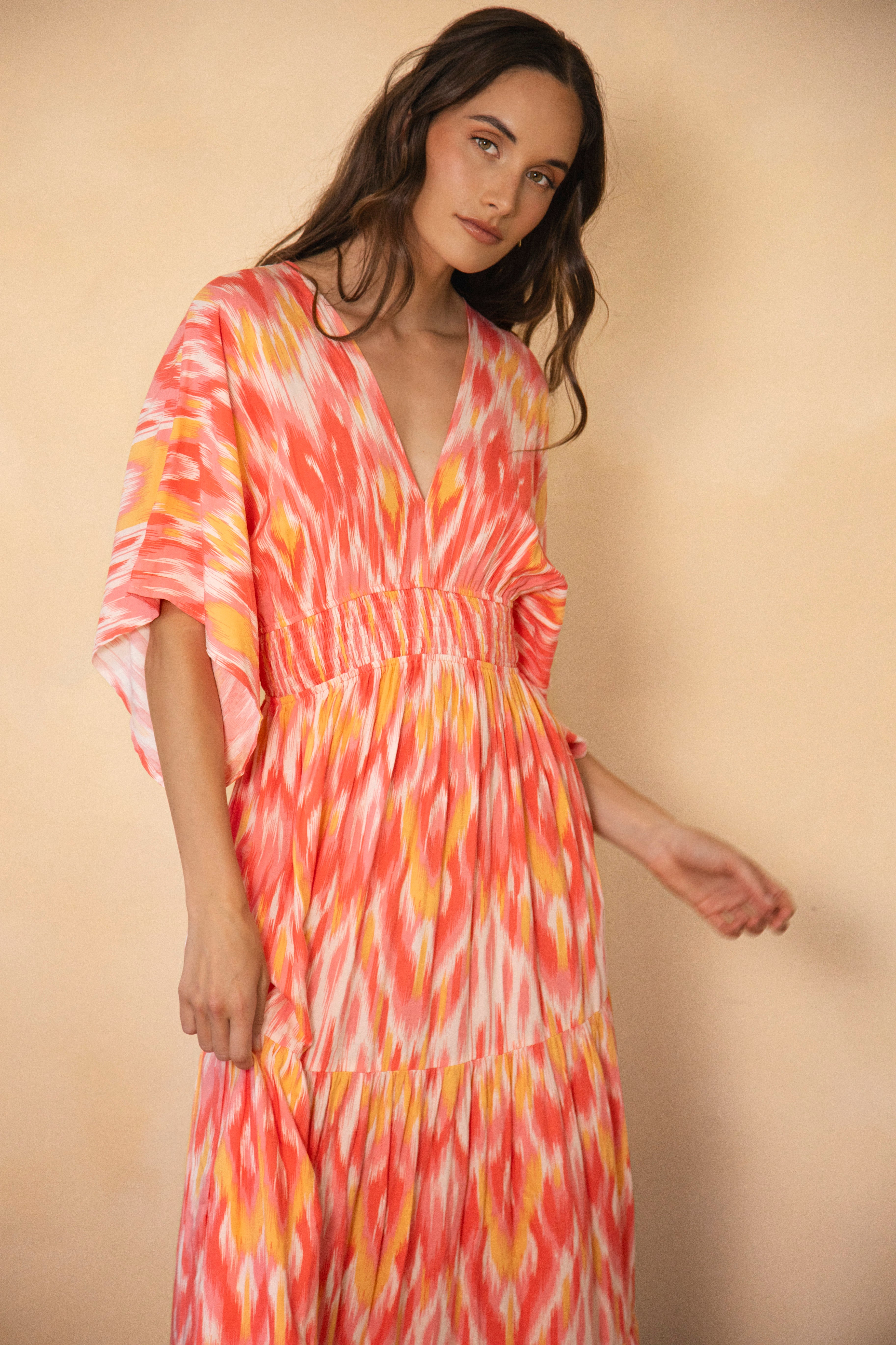 Lani Maxi Dress Sunburst featuring shirred waist and v neckline with tiered maxi skirt