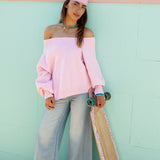 Leilani Off Shoulder Knit Candy Pink. Light pink jumper featuring oversized fit and off the shoulder style.