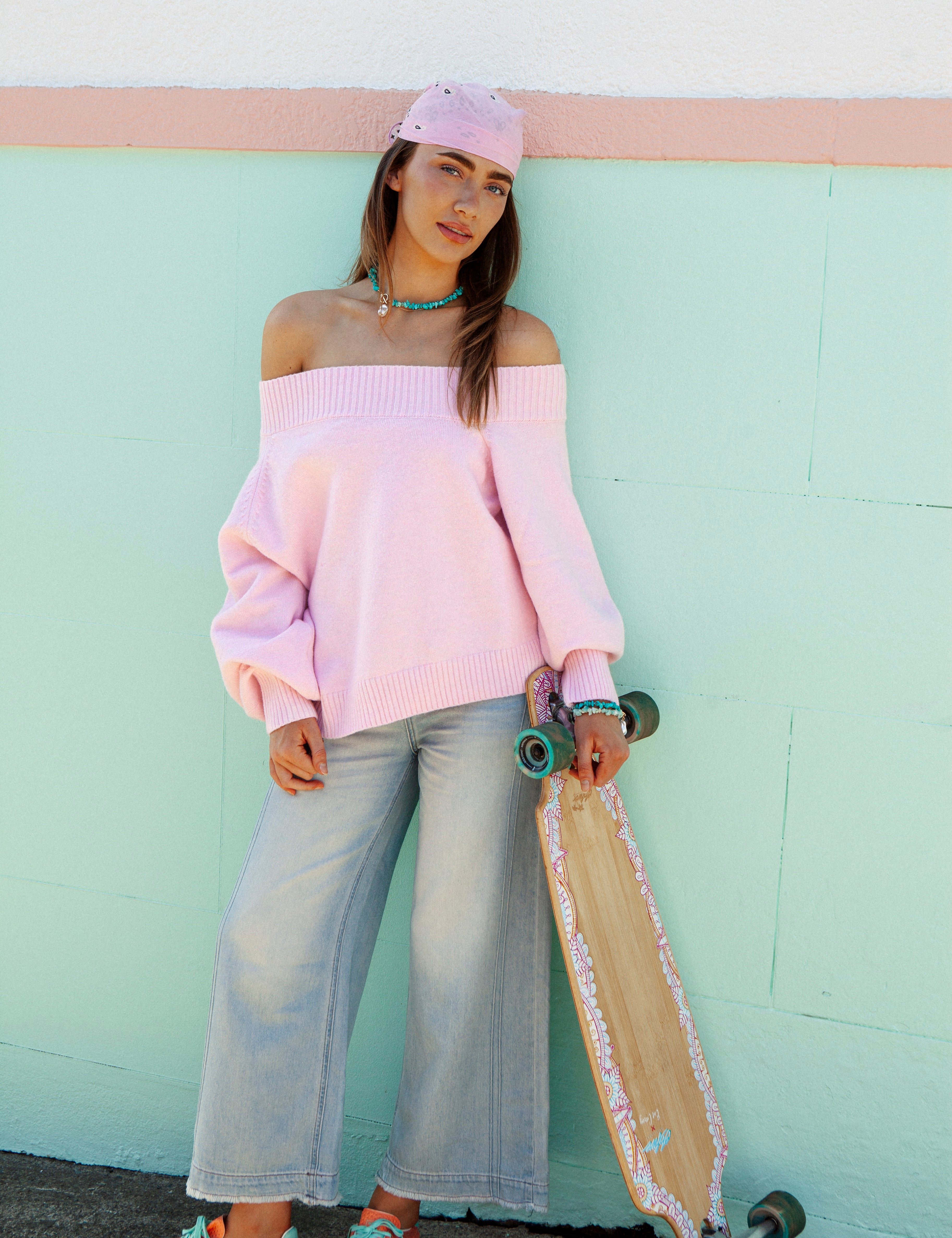 Leilani Off Shoulder Knit Candy Pink. Light pink jumper featuring oversized fit and off the shoulder style.