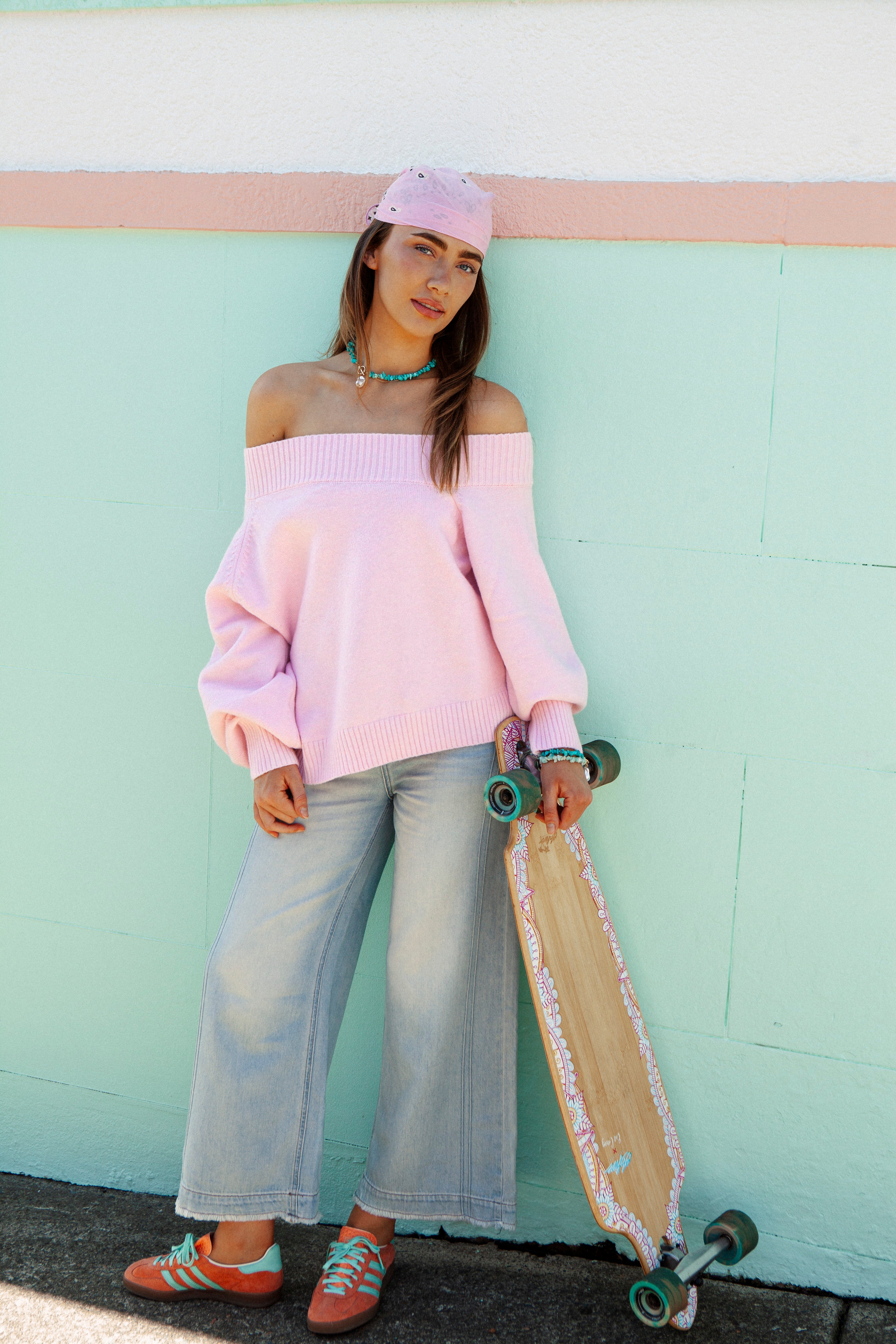 Leilani Off Shoulder Knit Candy Pink. Light pink jumper featuring oversized fit and off the shoulder style.