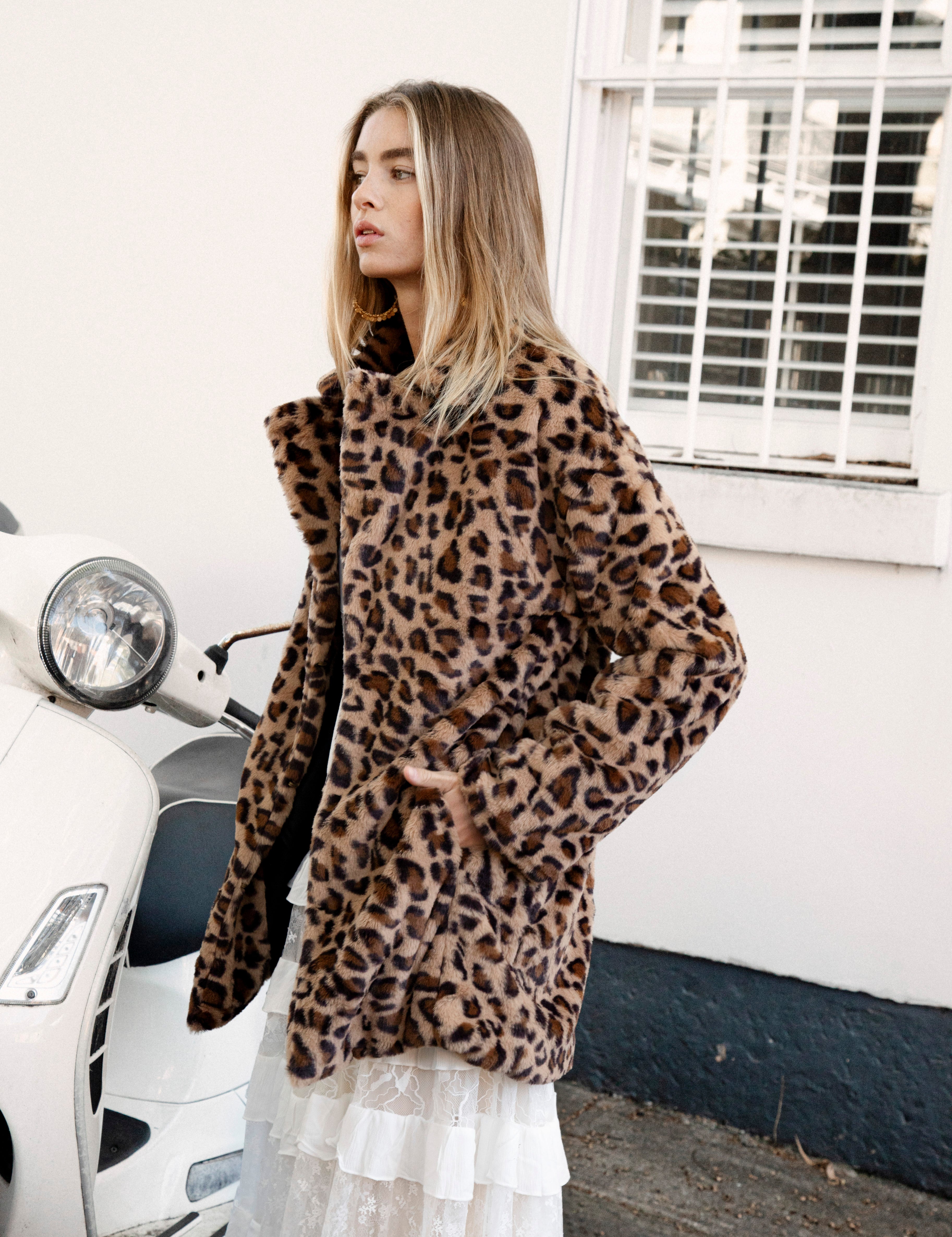 Leopard Luxe Faux Fur Coat - side view showcasing pockets