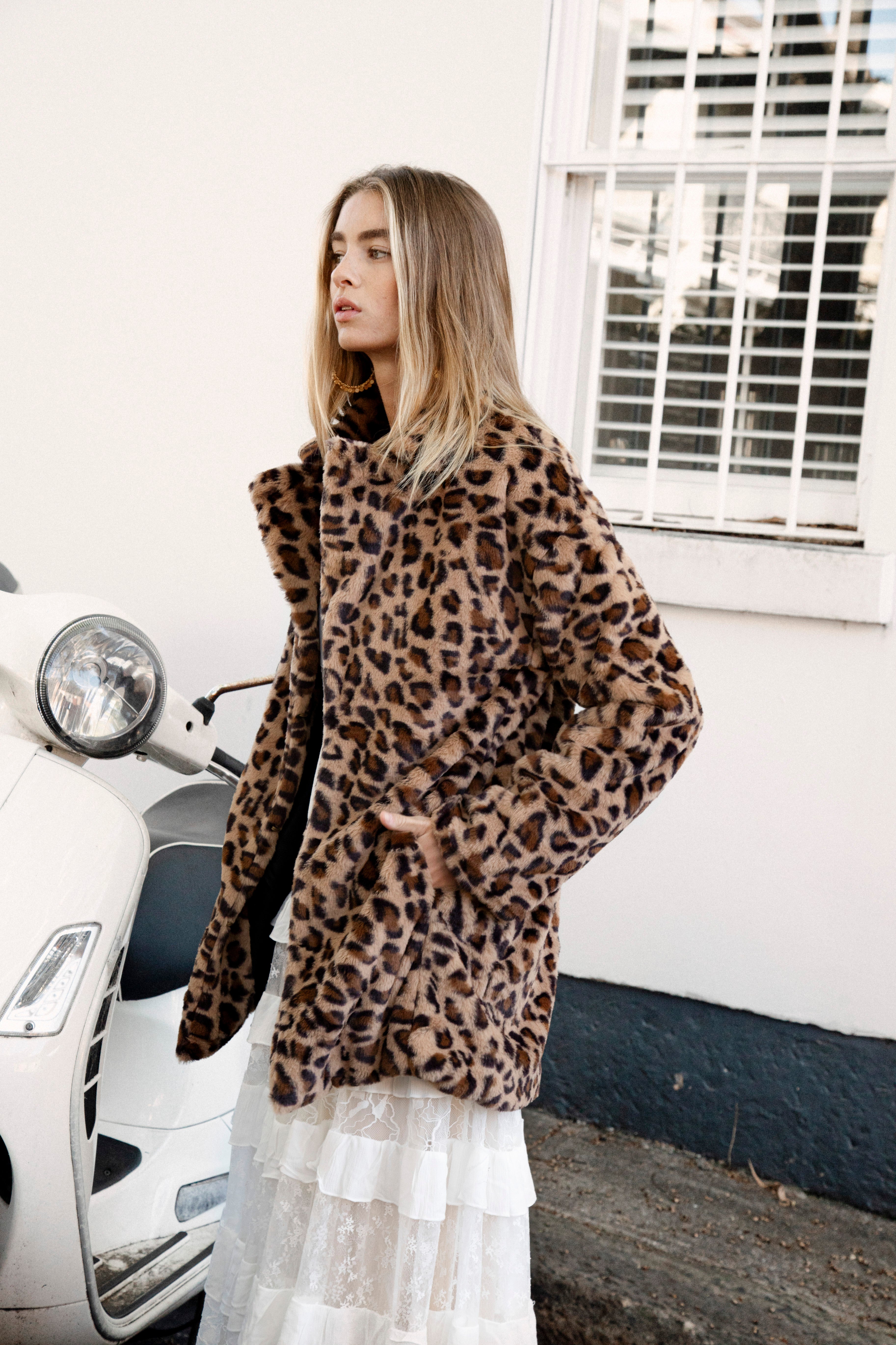 Leopard Luxe Faux Fur Coat - side view showcasing pockets