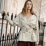 Lumae Trench Coat featuring wide lapes, double breasted style, fabric belt closure and stone colourway