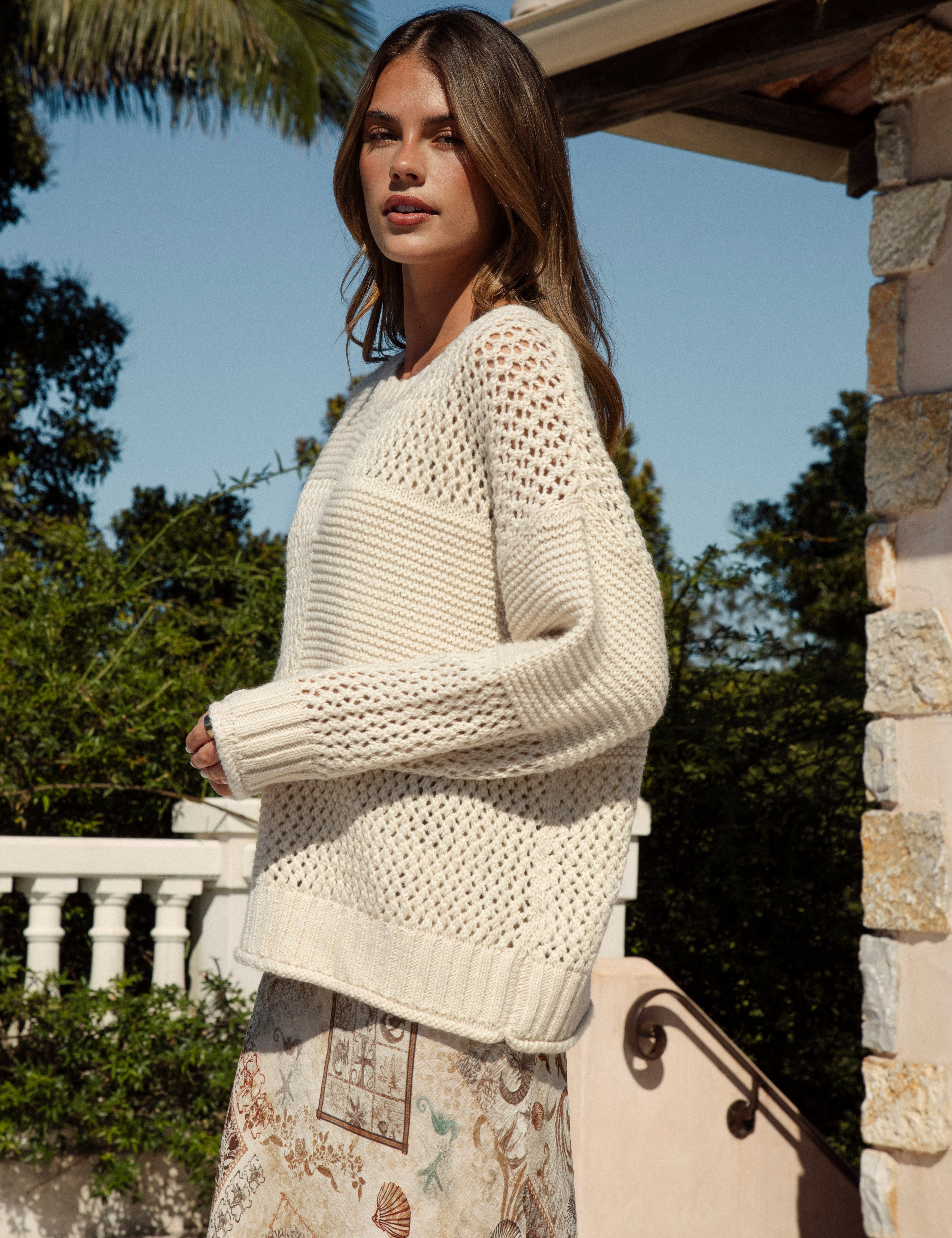 Luna Sweater Cream side view showcasing contrasting knit styles