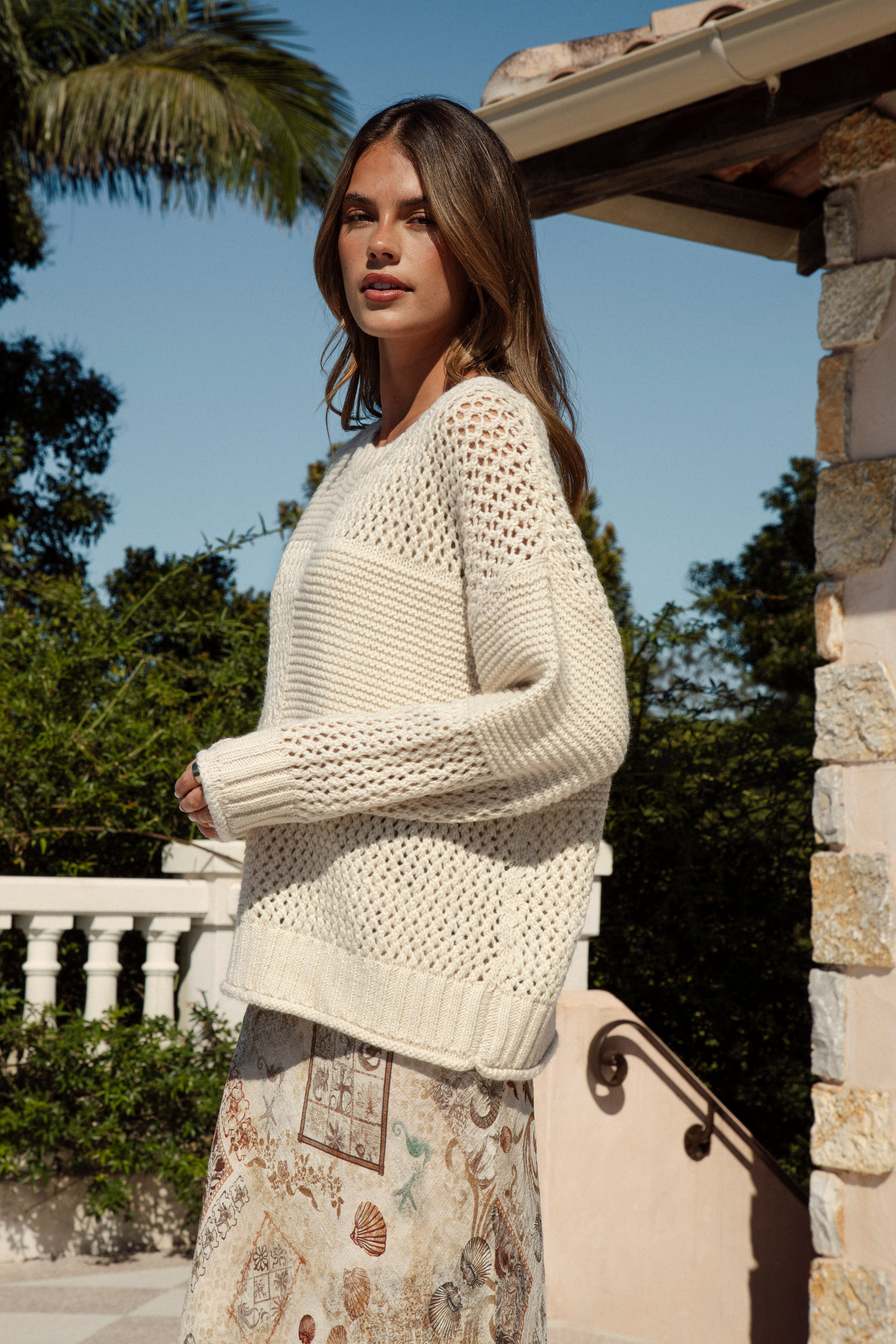 Luna Sweater Cream side view showcasing contrasting knit styles