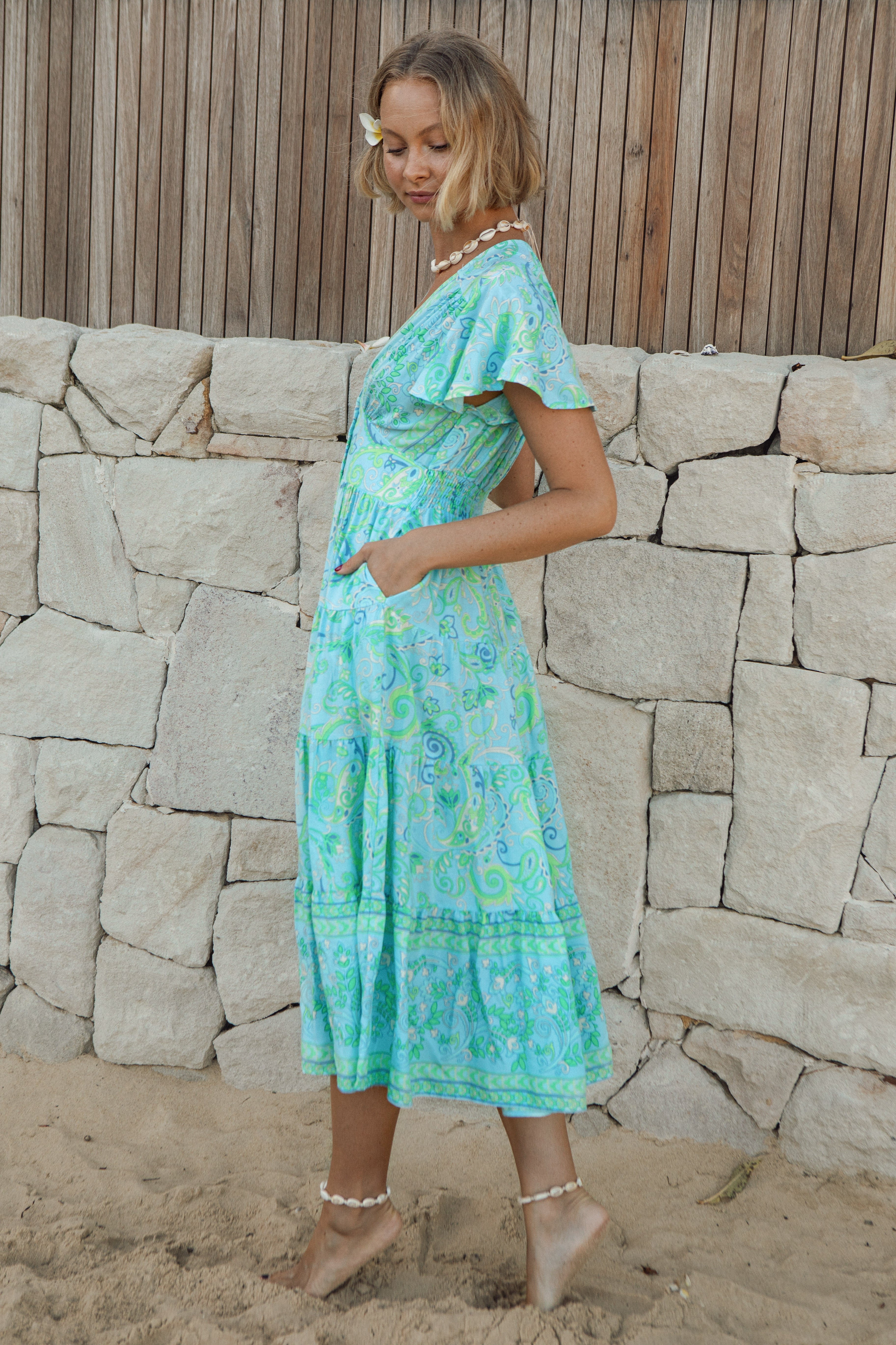 Lyric Midi Dress - Waterlily Side view showcasing cap sleeves