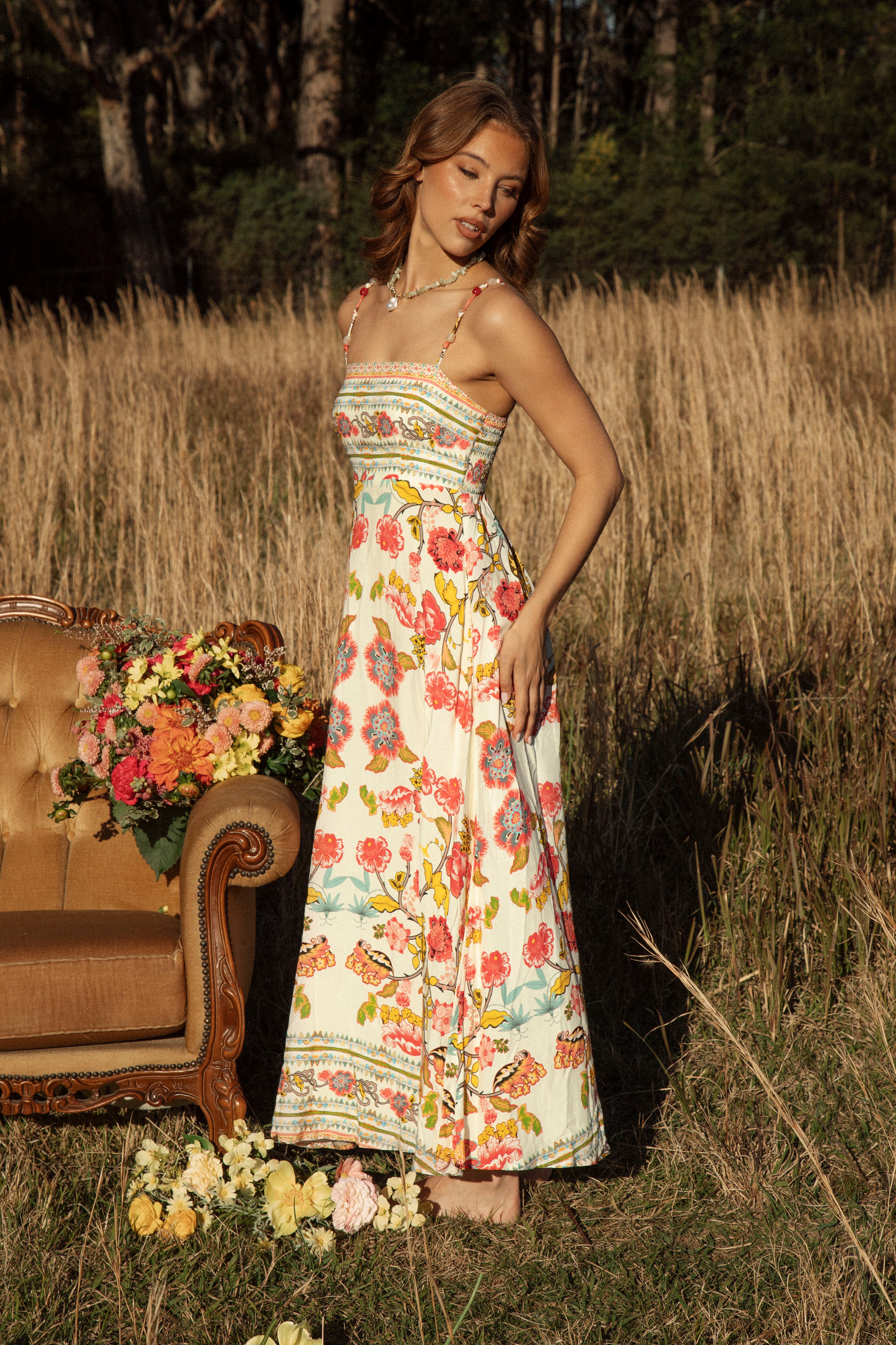 Maisie Sundress Golden Bloom - side view of Boho floral pattern and contrasting trim on bodice and hem