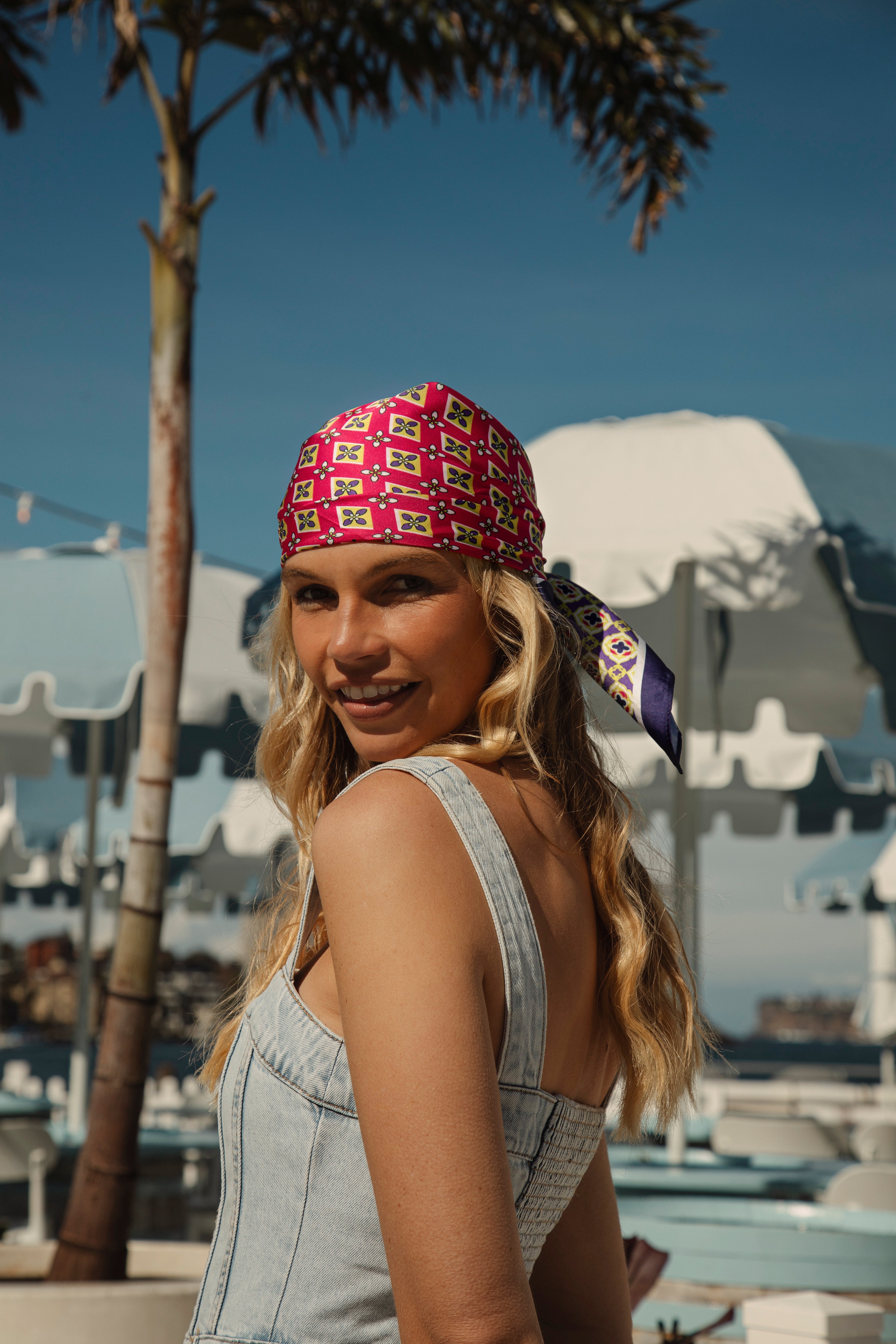 Majorca Scarf Fuchsia worn bandana style