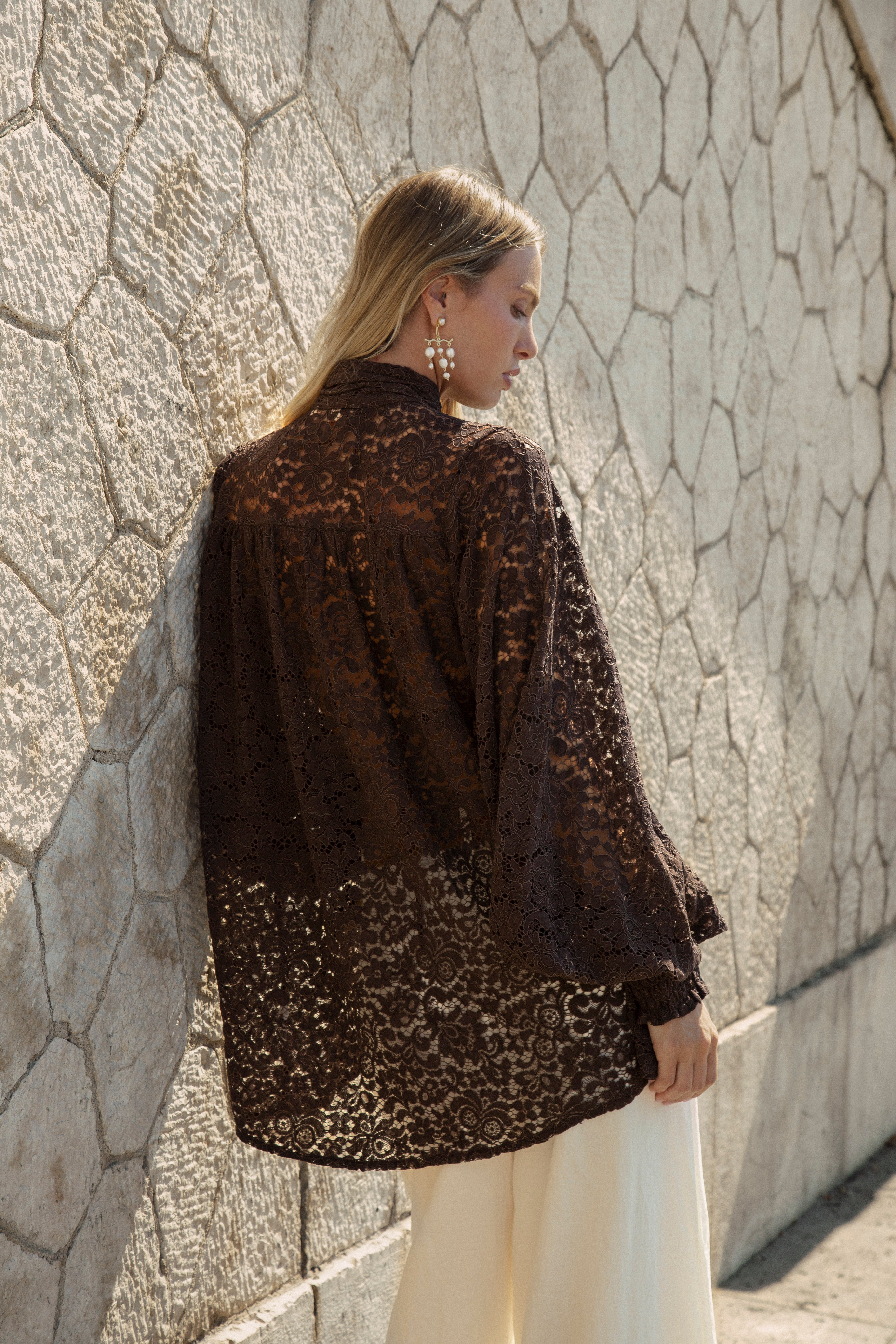 Margot Lace Blouse Espresso - rear view showcasing lace fabric, balloon sleeves and oversized fit