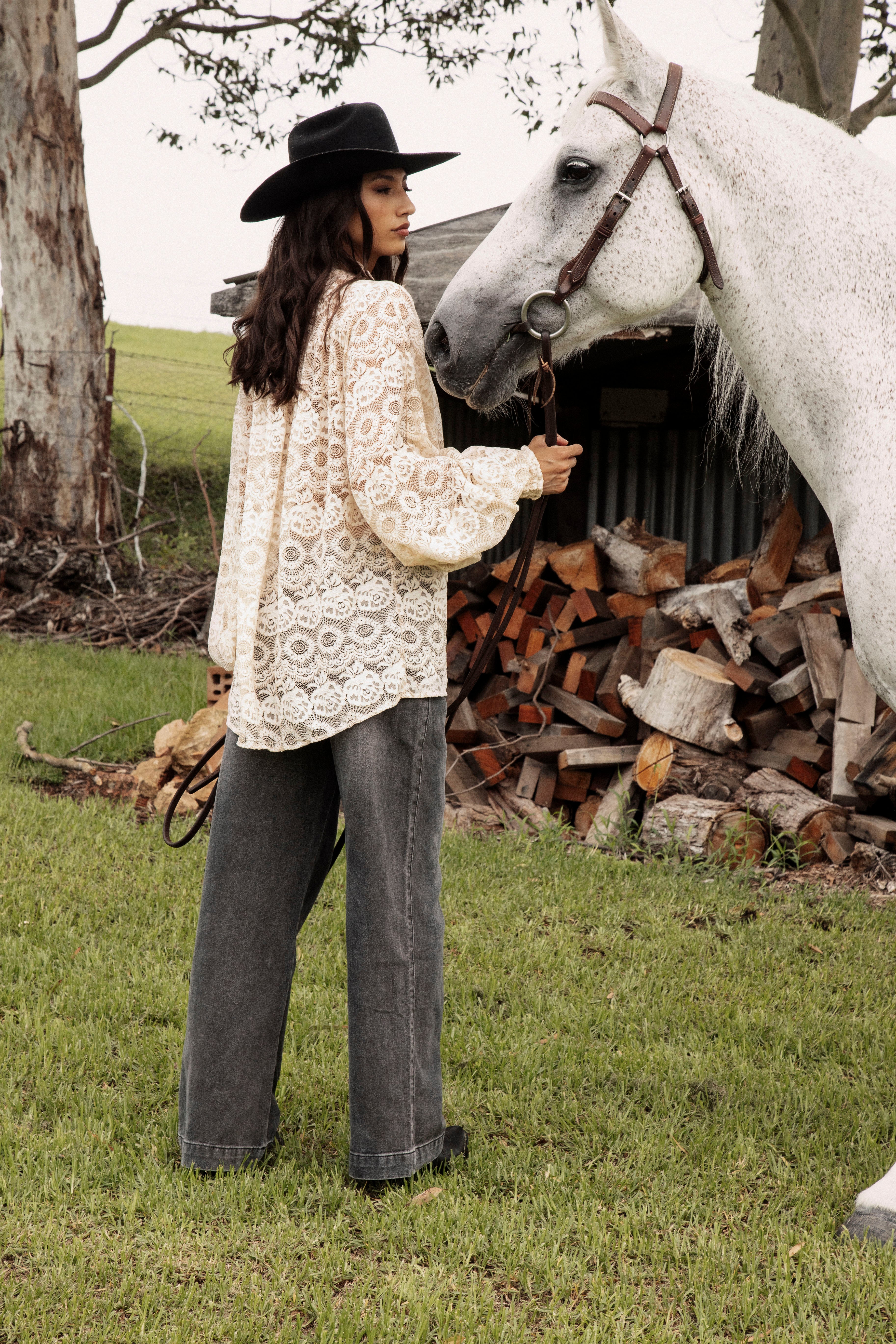Margot Lace Blouse Macadamia. Rear view showcasing oversized style, billowy long sleeves and cream colourway.