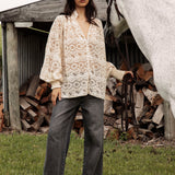 Margot Lace Blouse Macadamia showcasing button down style, stand collar, billowy cuffed sleeves.