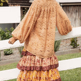 Margot Lace Blouse Terracotta. Rear view showcasing oversized fit, billowy style and lace fabric.
