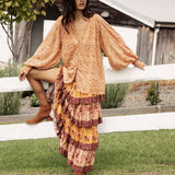 Margot Lace Blouse Terracotta showcasing button down style, stand collar, billowy sleeves and oversized fit.