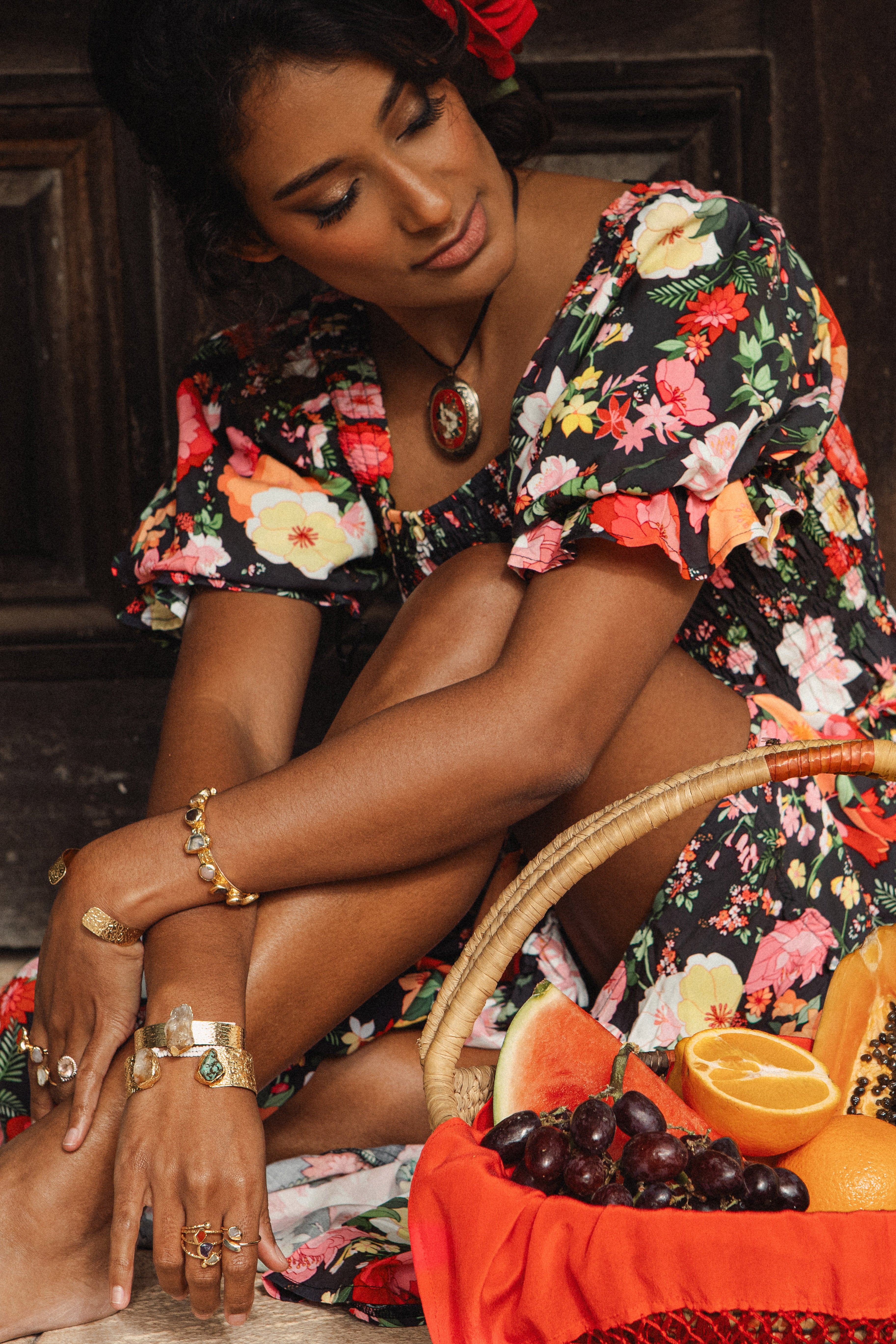 Mariana Top Flamenco is a crop style top with shirred bodice featuring a floral pattern on black colourway