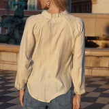 Mirella Blouse - rear view showcasing gathering at shoulders