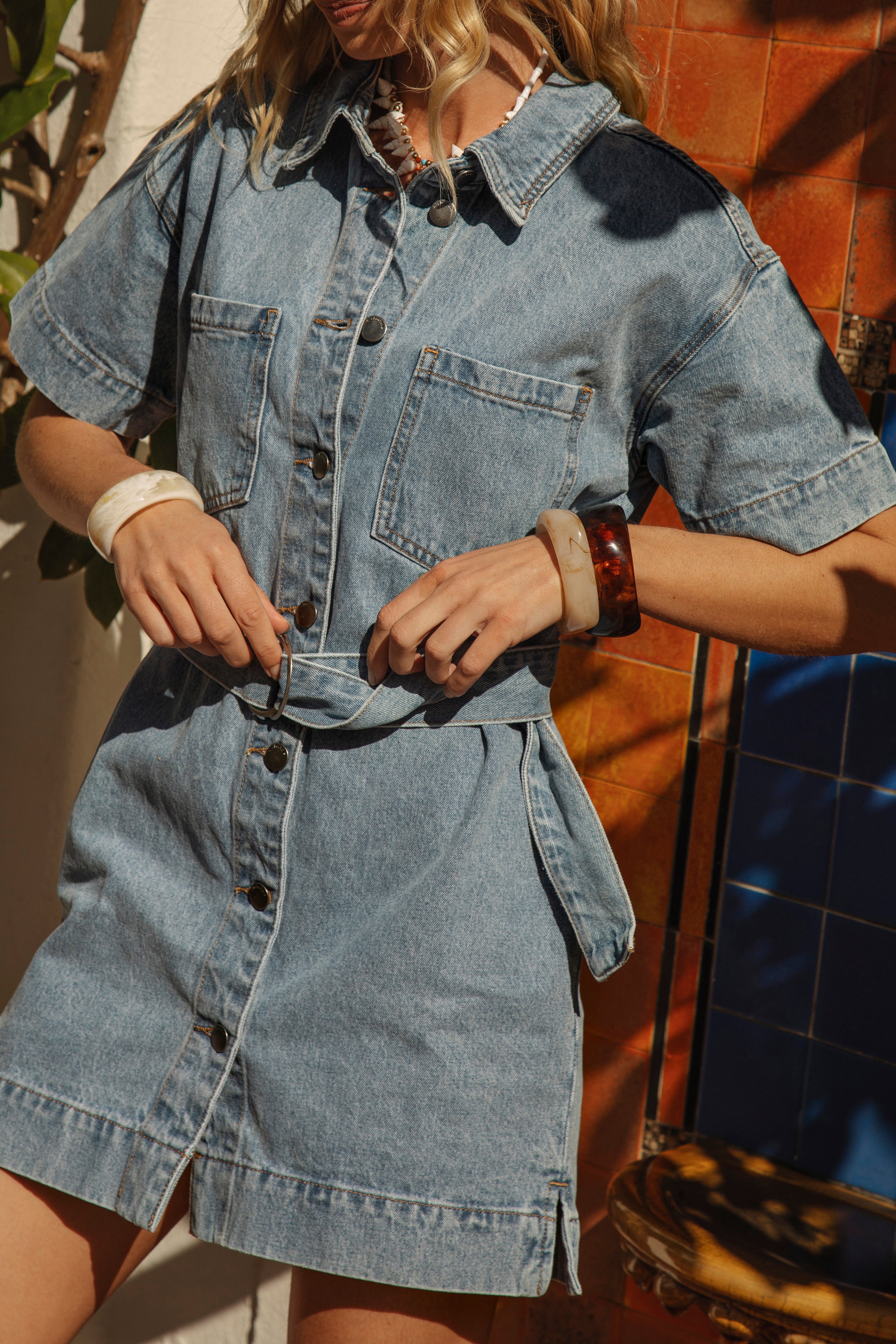 Naya Belted Denim Mini Dress featuring statement pockets on chest