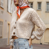 Odette Cardigan in cream with statement tortoiseshell buttons
