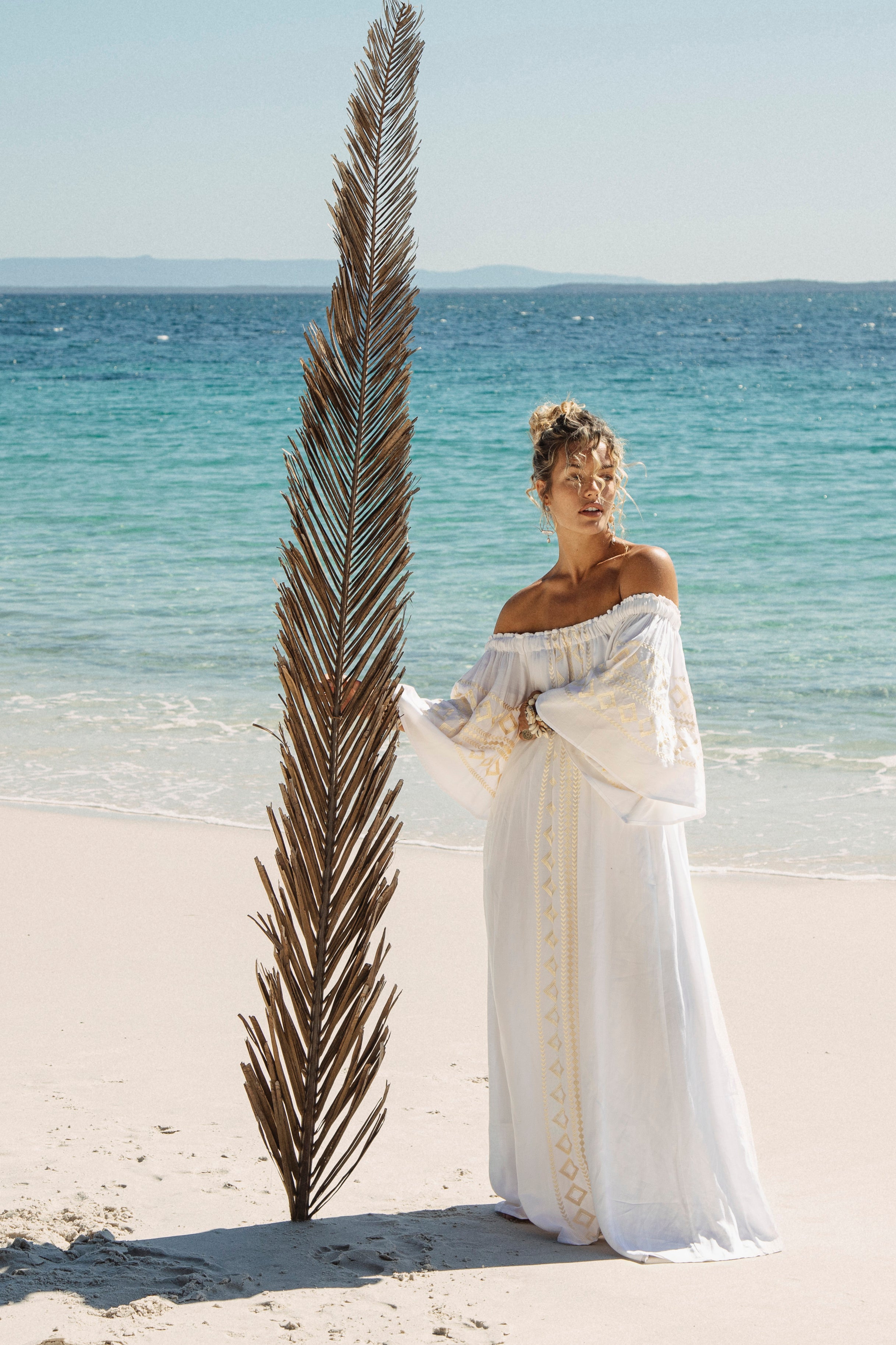 Odyssey Maxi Dress is a grecian style off shoulder maxi dress