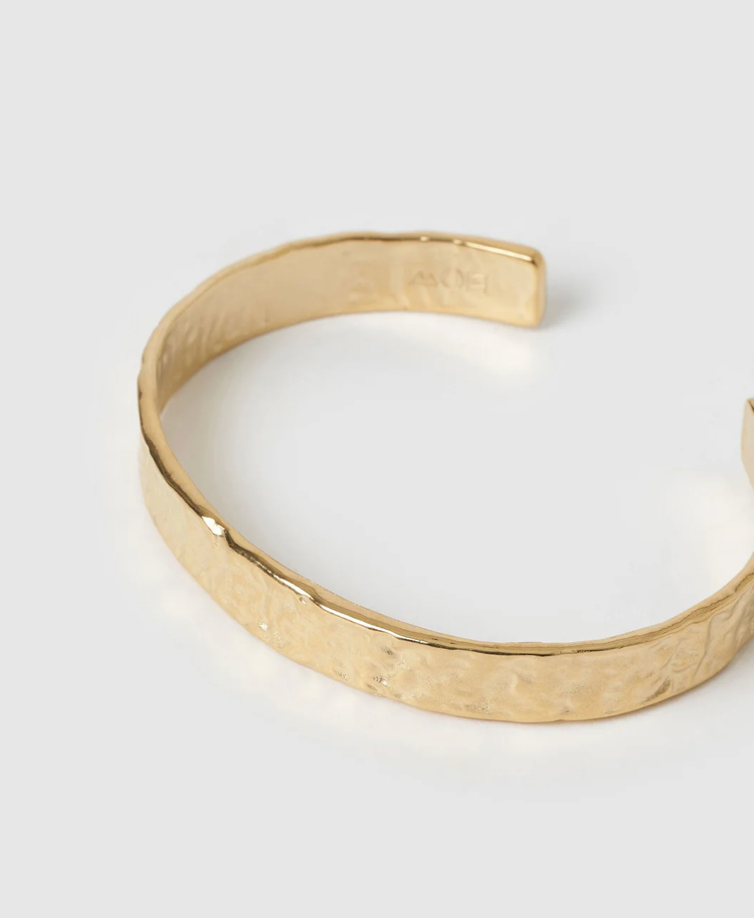 Olivia Gold Cuff Bracelet showcsing textured finish