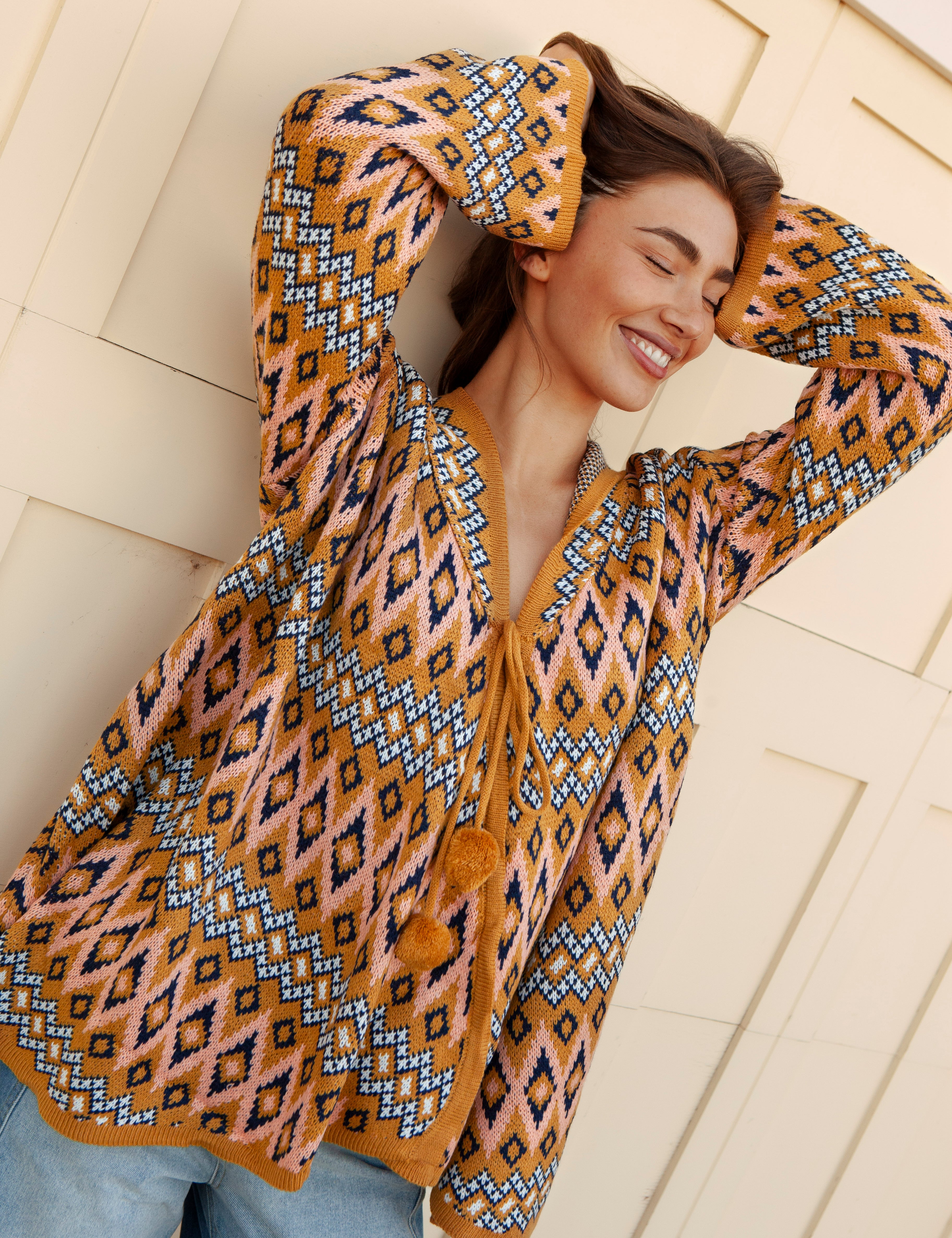 One Love Hooded Cardi Aztec featuring Aztec inspired geometric pattern in mustard tones