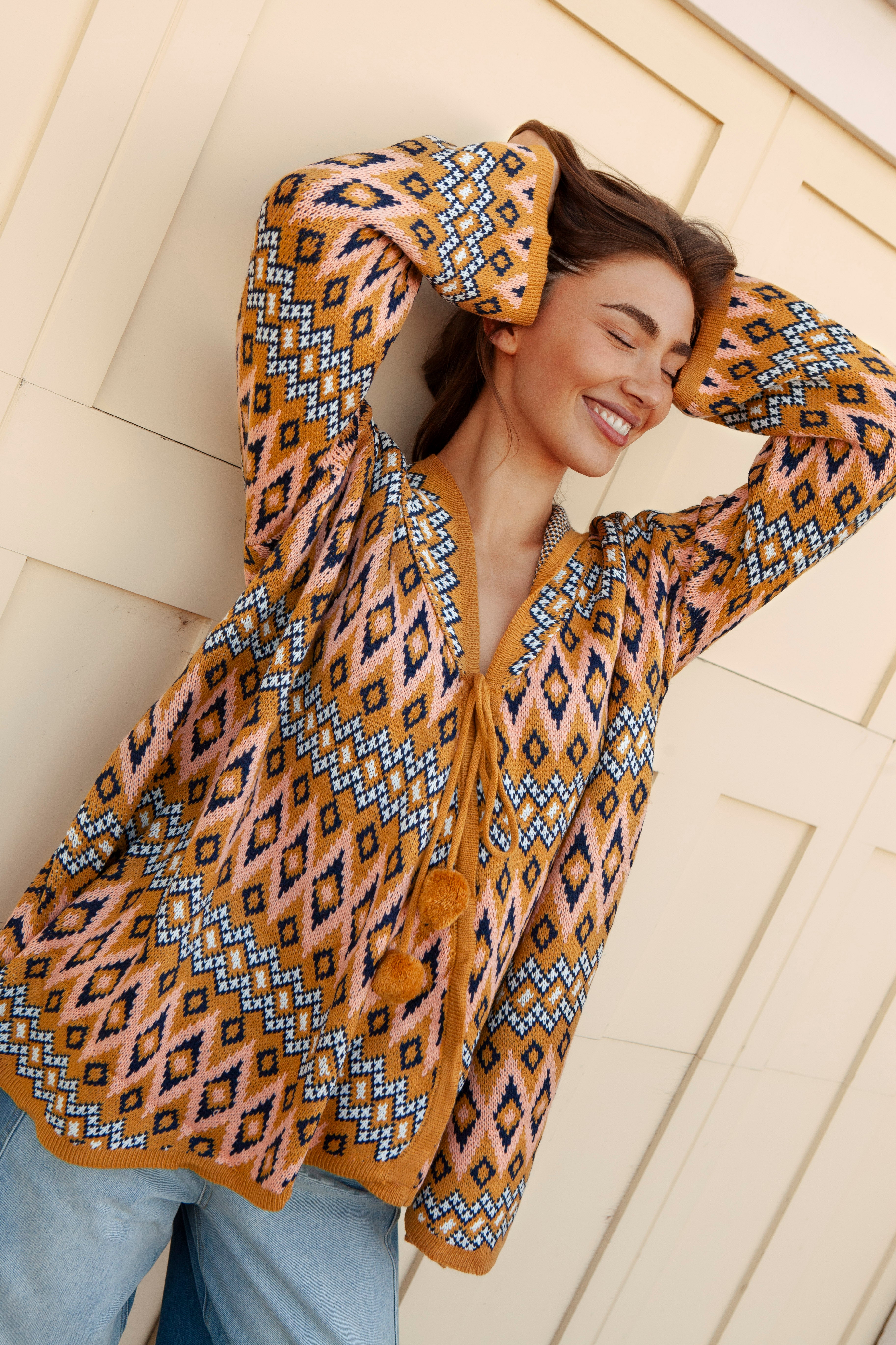 One Love Hooded Cardi Aztec featuring Aztec inspired geometric pattern in mustard tones