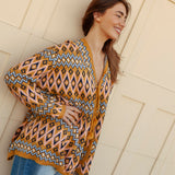 One Love Hooded Cardi Aztec - side view showcasing tie closure with pom pom detail
