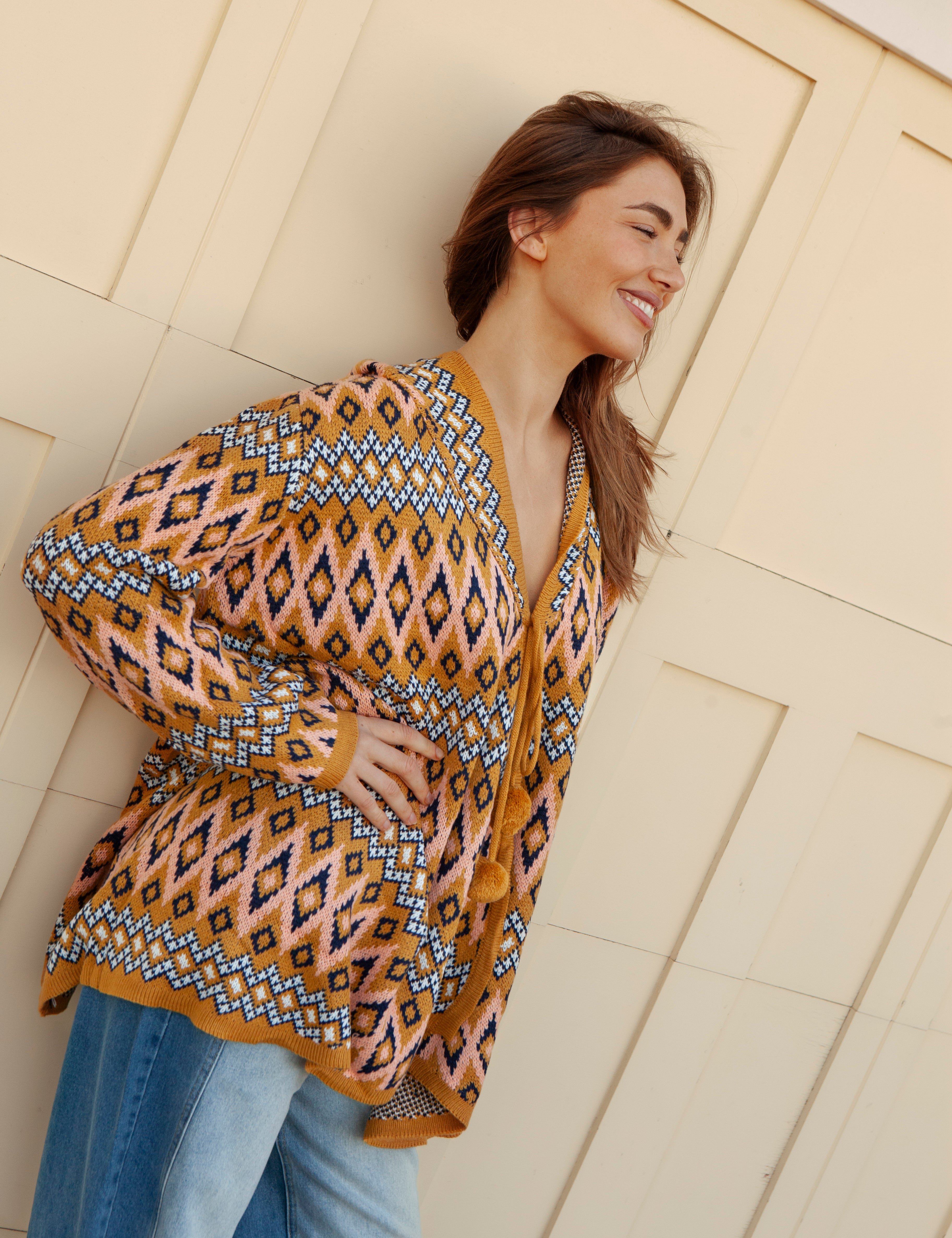 One Love Hooded Cardi Aztec - side view showcasing tie closure with pom pom detail