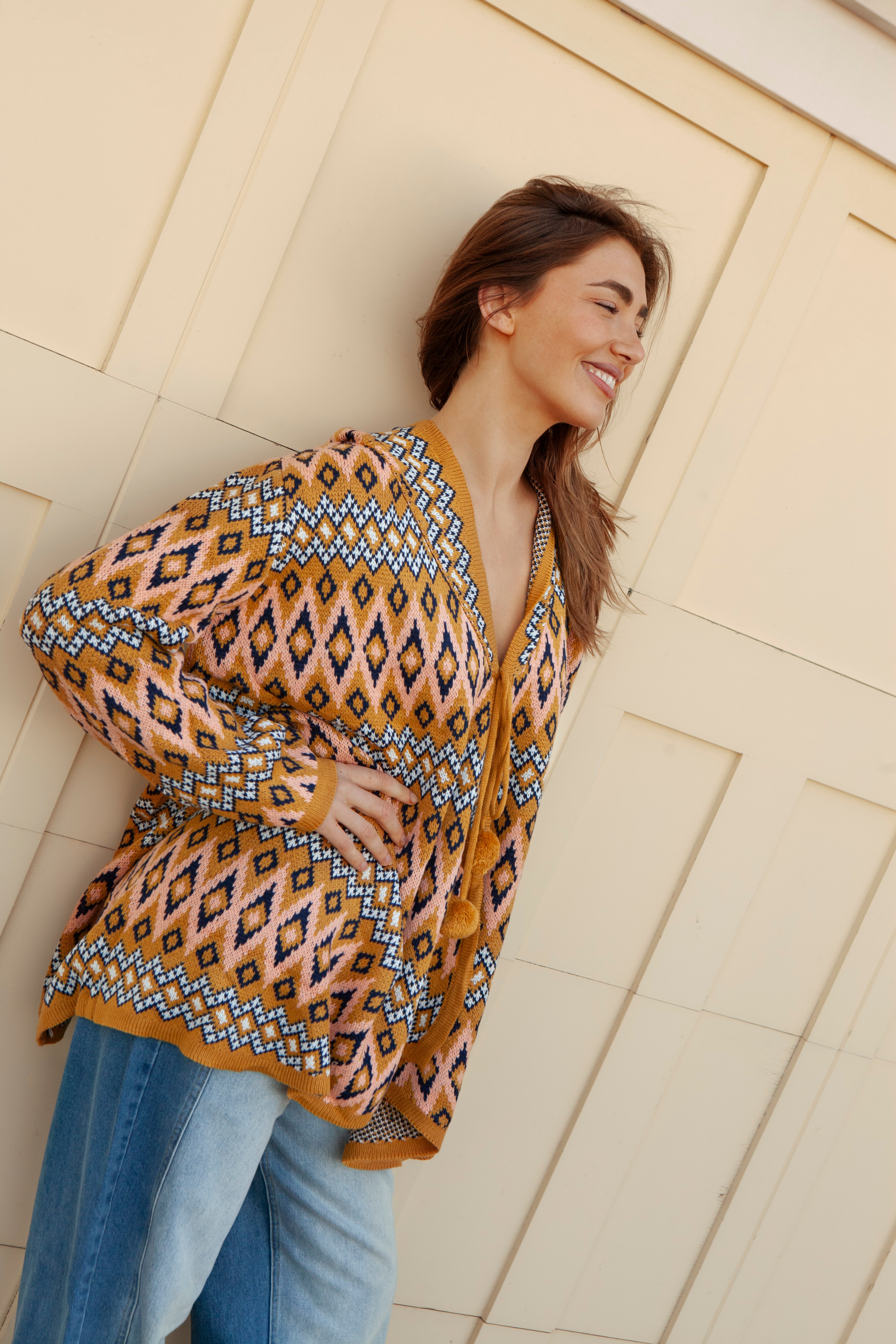 One Love Hooded Cardi Aztec - side view showcasing tie closure with pom pom detail