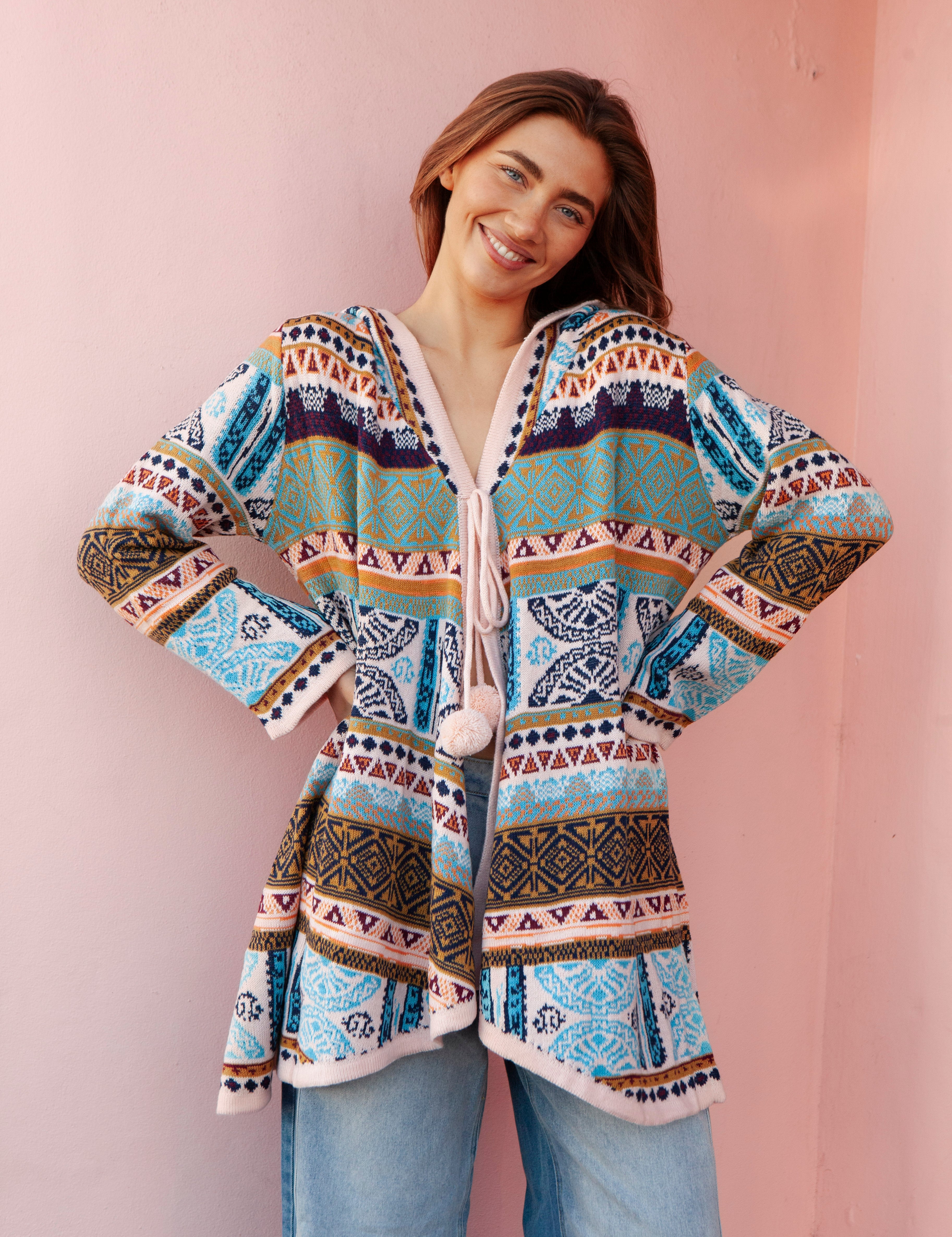 One Love Hooded Cardi Nomad - showcasing oversized fit and statement Boho pattern in shades of blue and mustard.