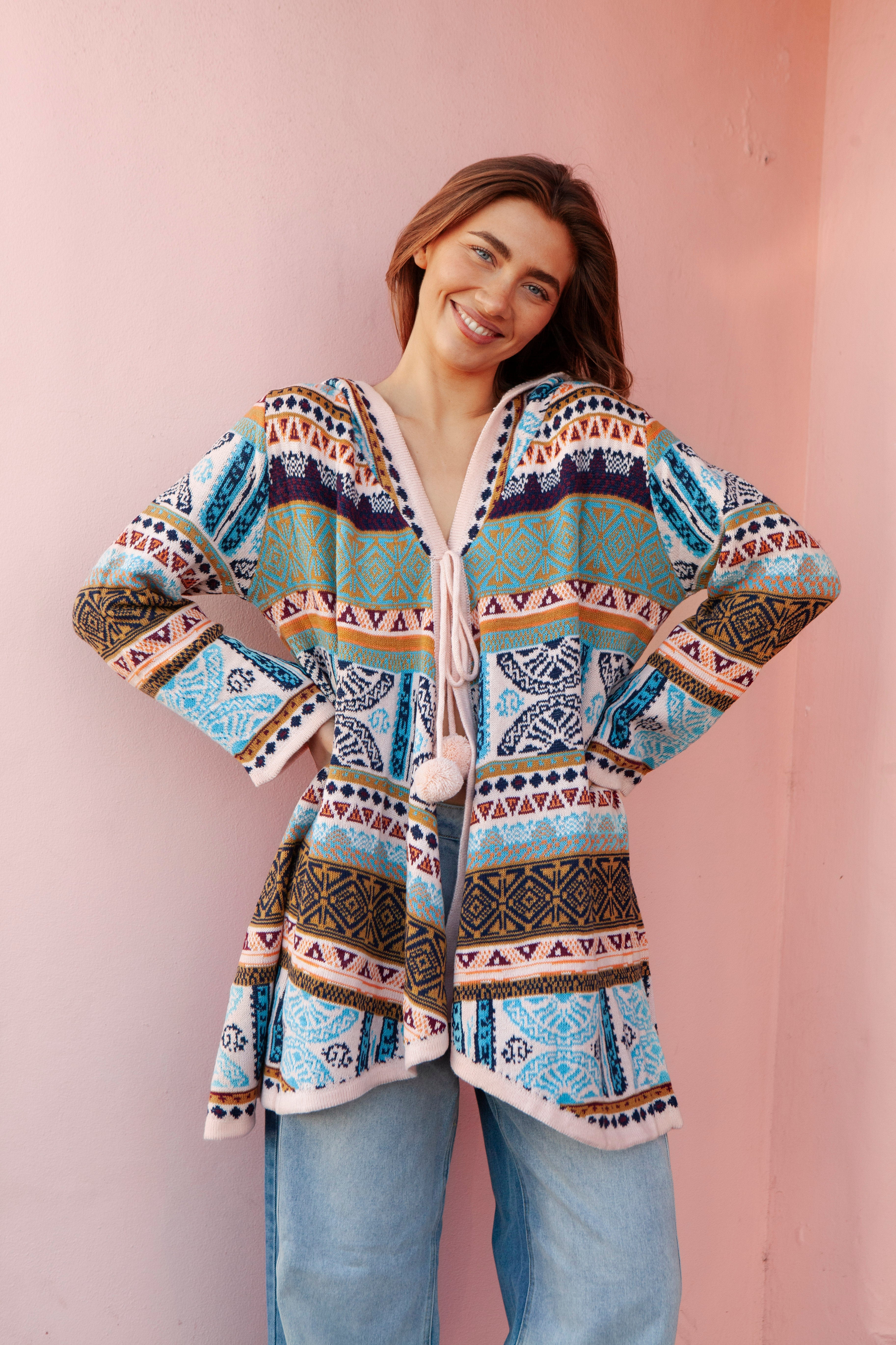 One Love Hooded Cardi Nomad - showcasing oversized fit and statement Boho pattern in shades of blue and mustard.