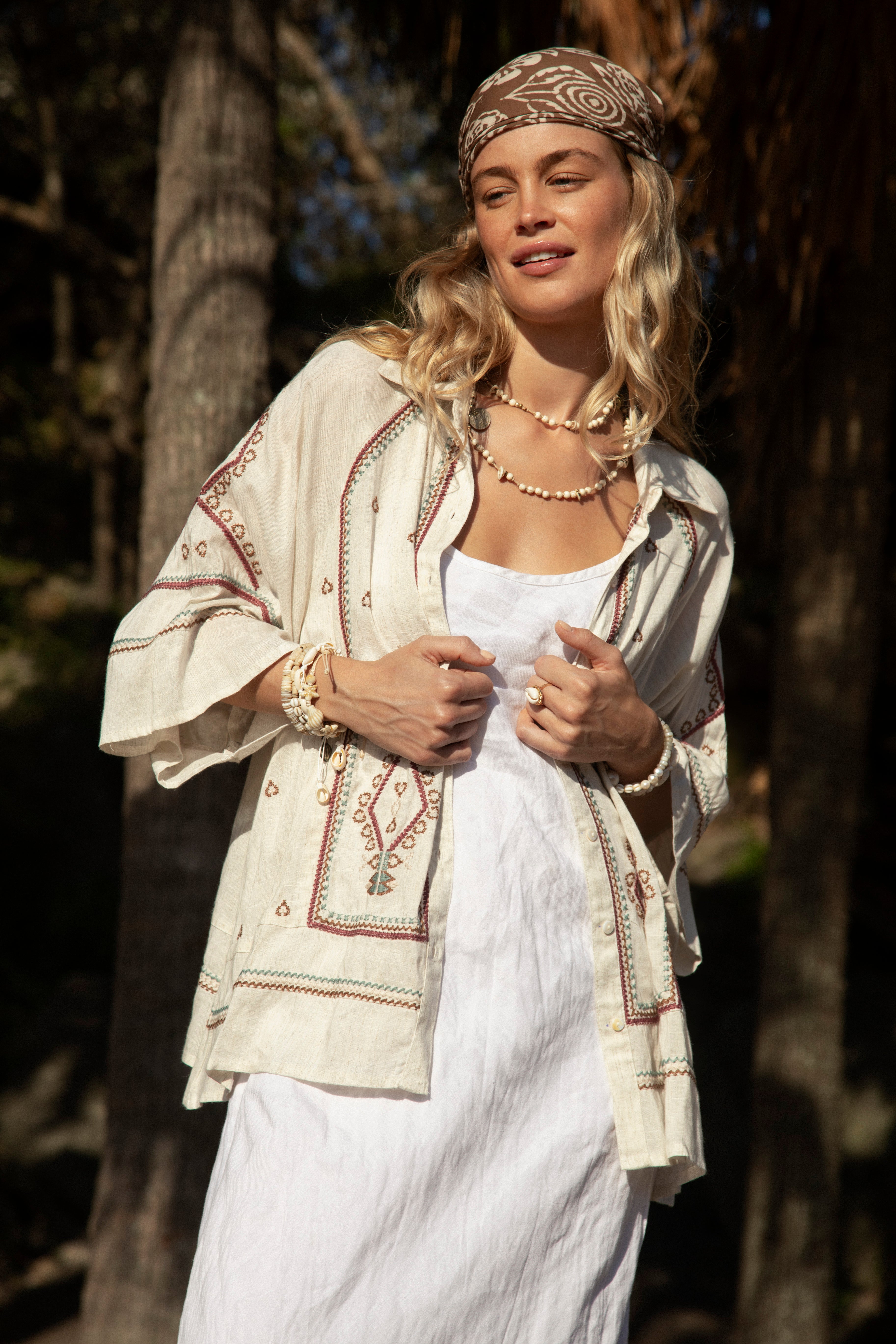 Palma Embroidered Shirt in Shell colourway is a natural coloured shirt featuring tribal embroidery in shades of aqua and brown