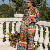 Paradise Pant Olea featuring Boho inspired print in shades of gold, blue red and cream