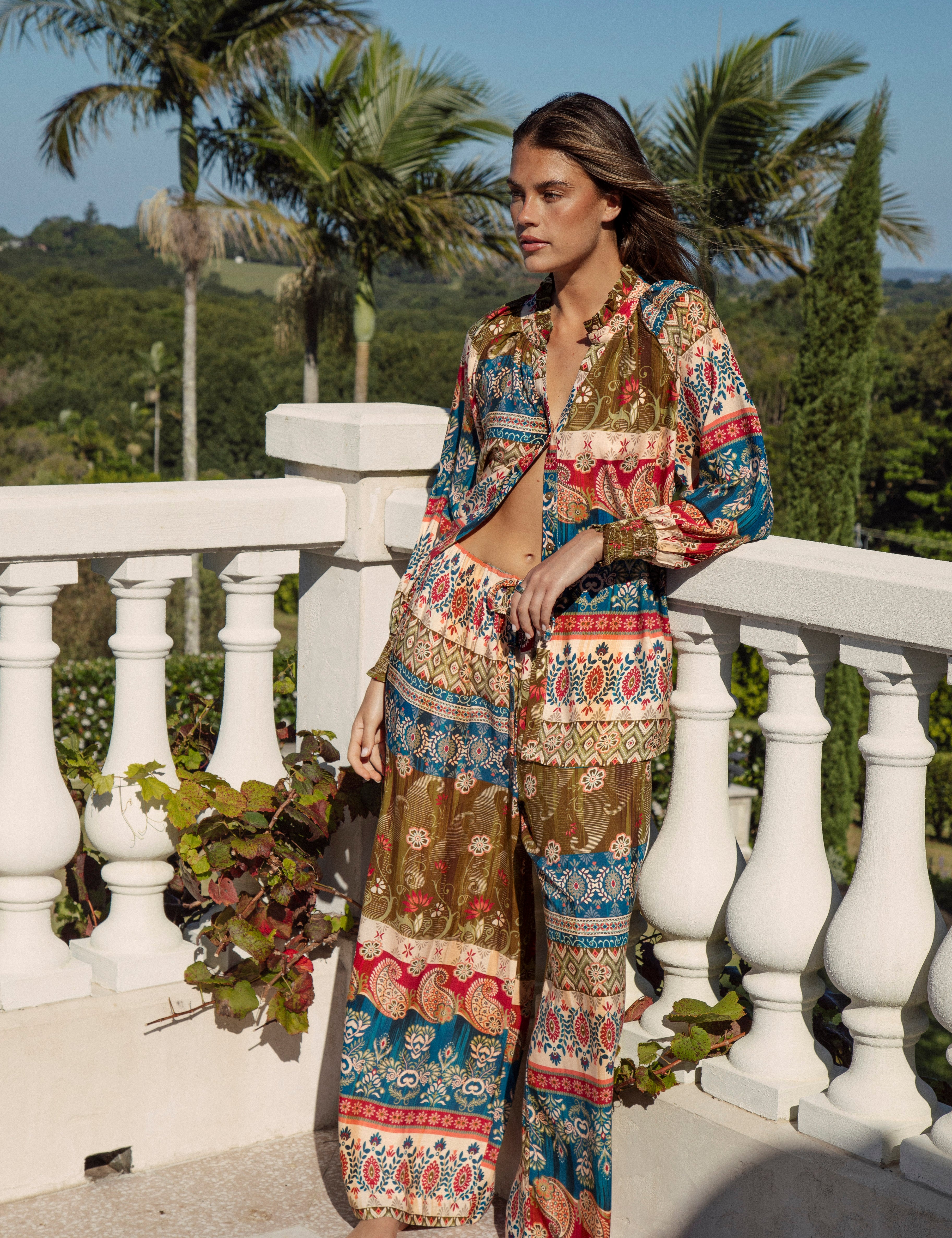 Paradise Pant Olea featuring Boho inspired print in shades of gold, blue red and cream
