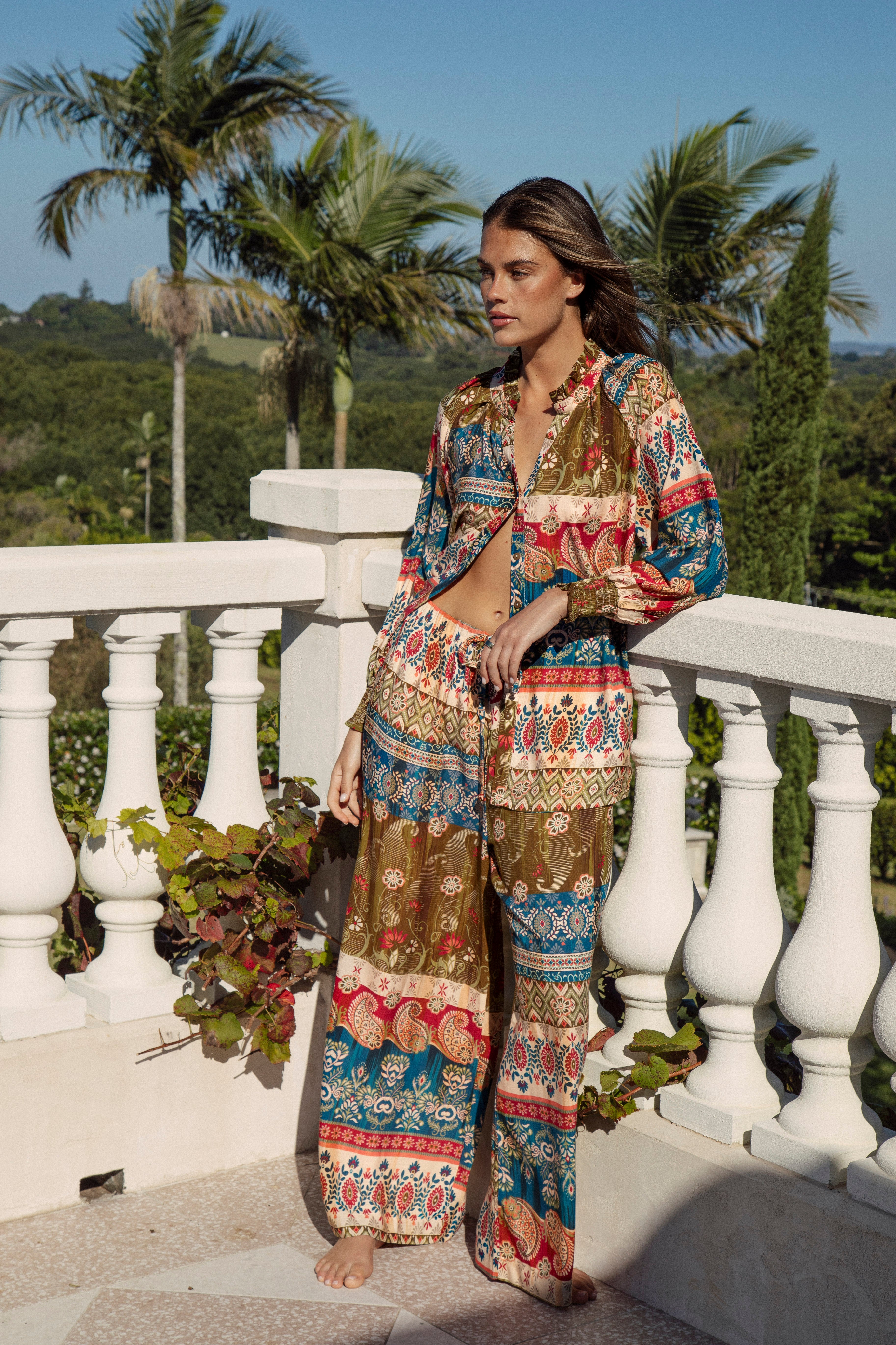 Paradise Pant Olea featuring Boho inspired print in shades of gold, blue red and cream