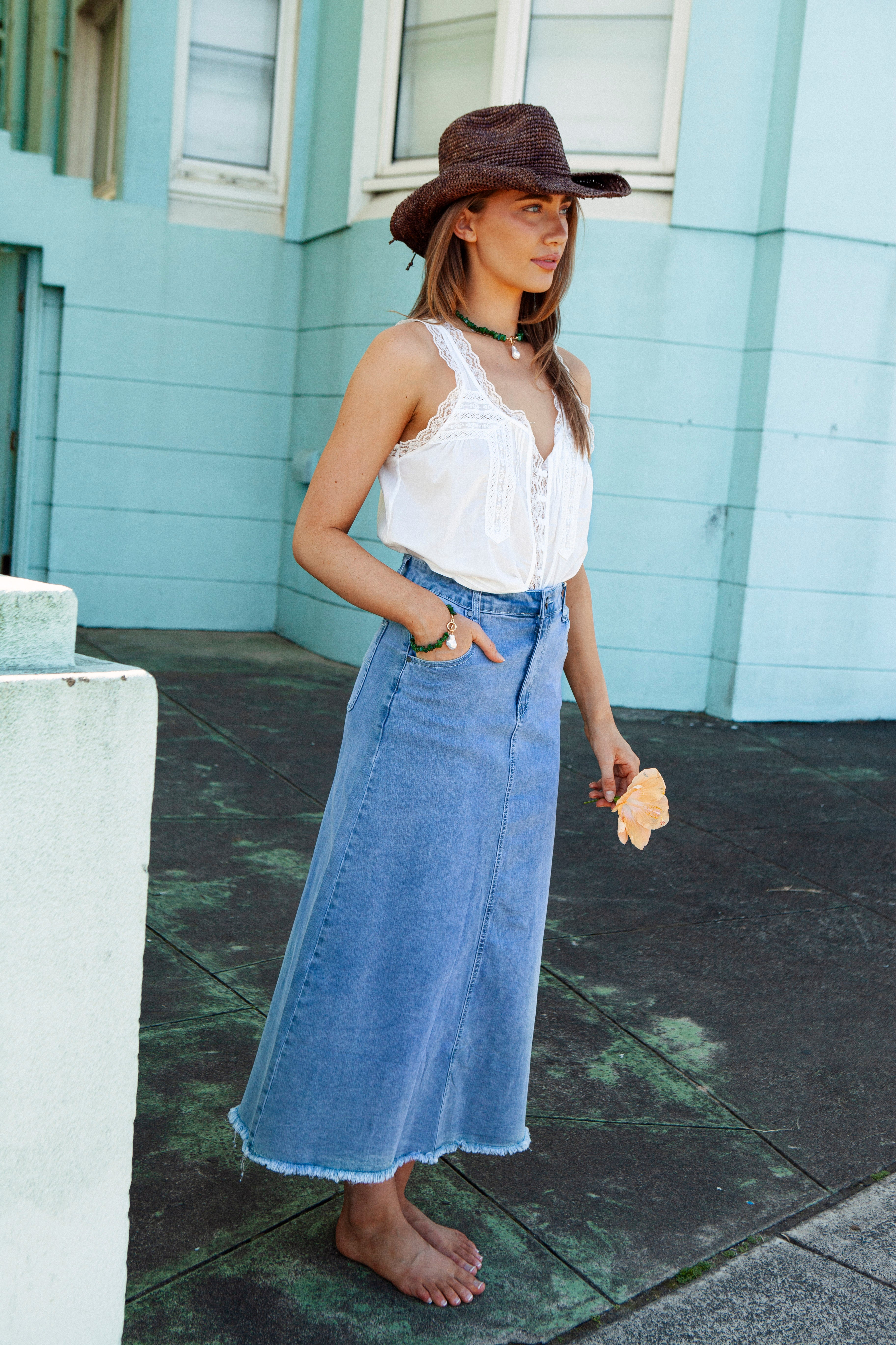 Penny Denim Skirt. Maxi length A-line denim skirt with frayed hem.