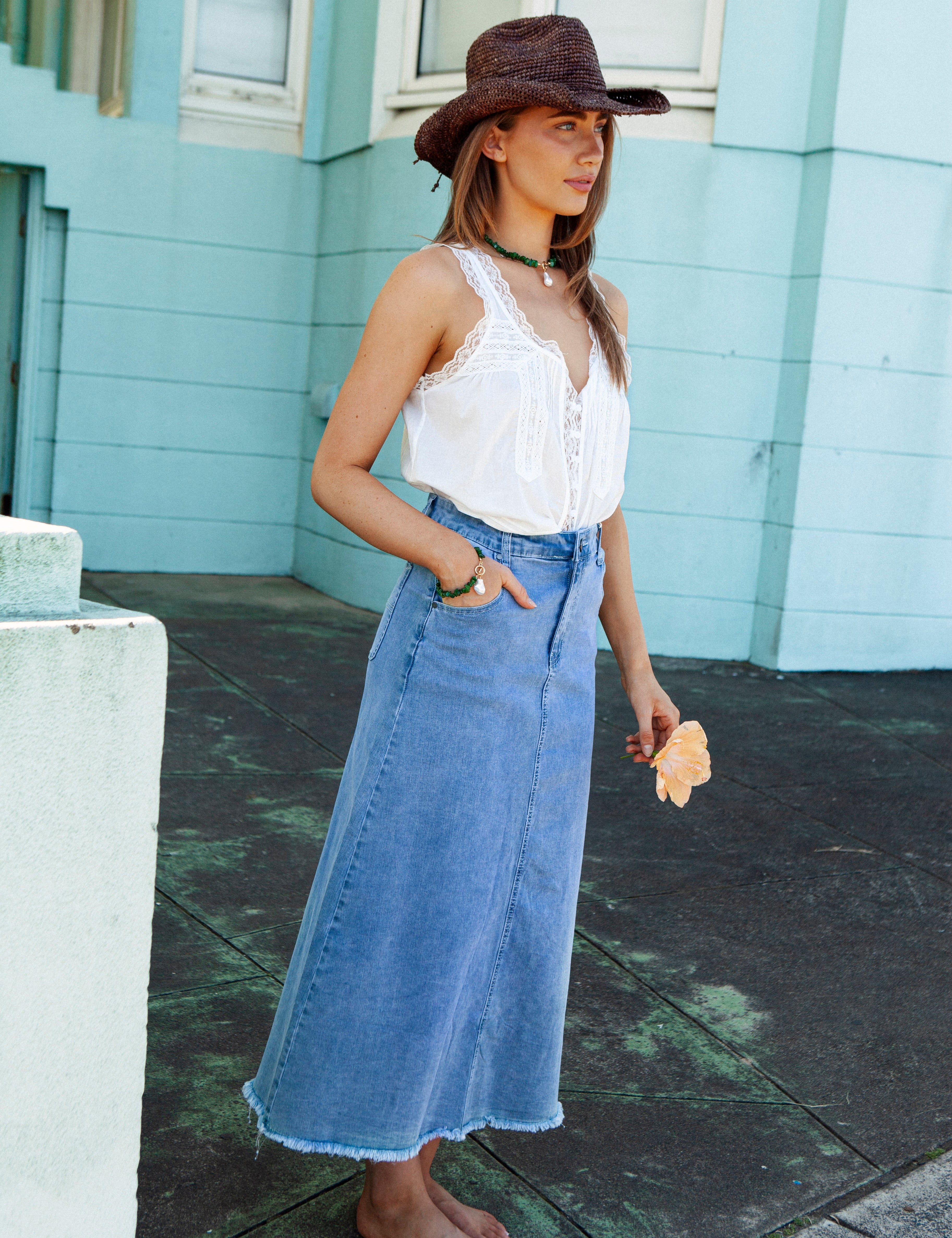 Penny Denim Skirt. Maxi length A-line denim skirt with frayed hem.