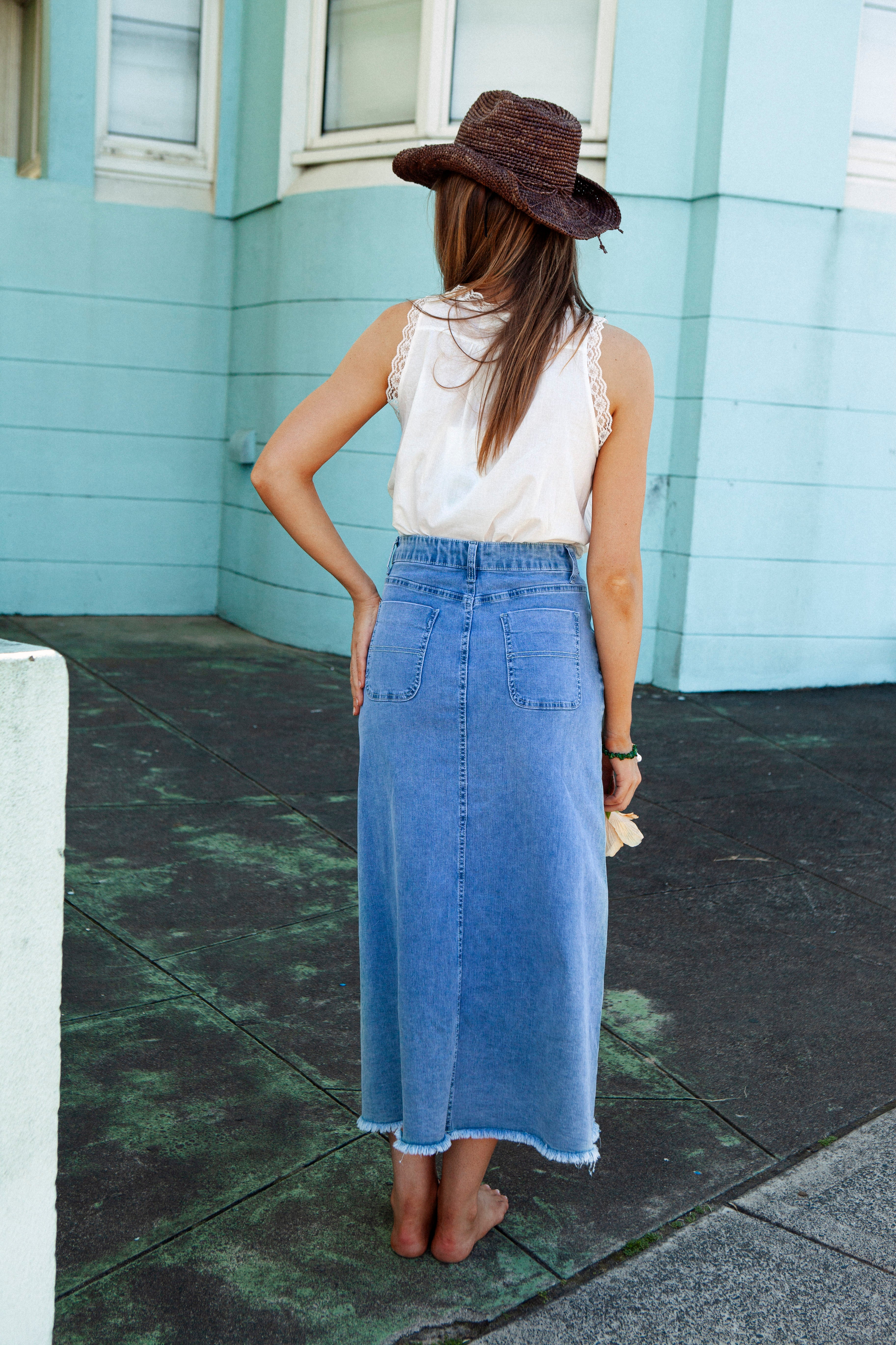 Penny Denim Skirt. Rear View. Mid wash denim.