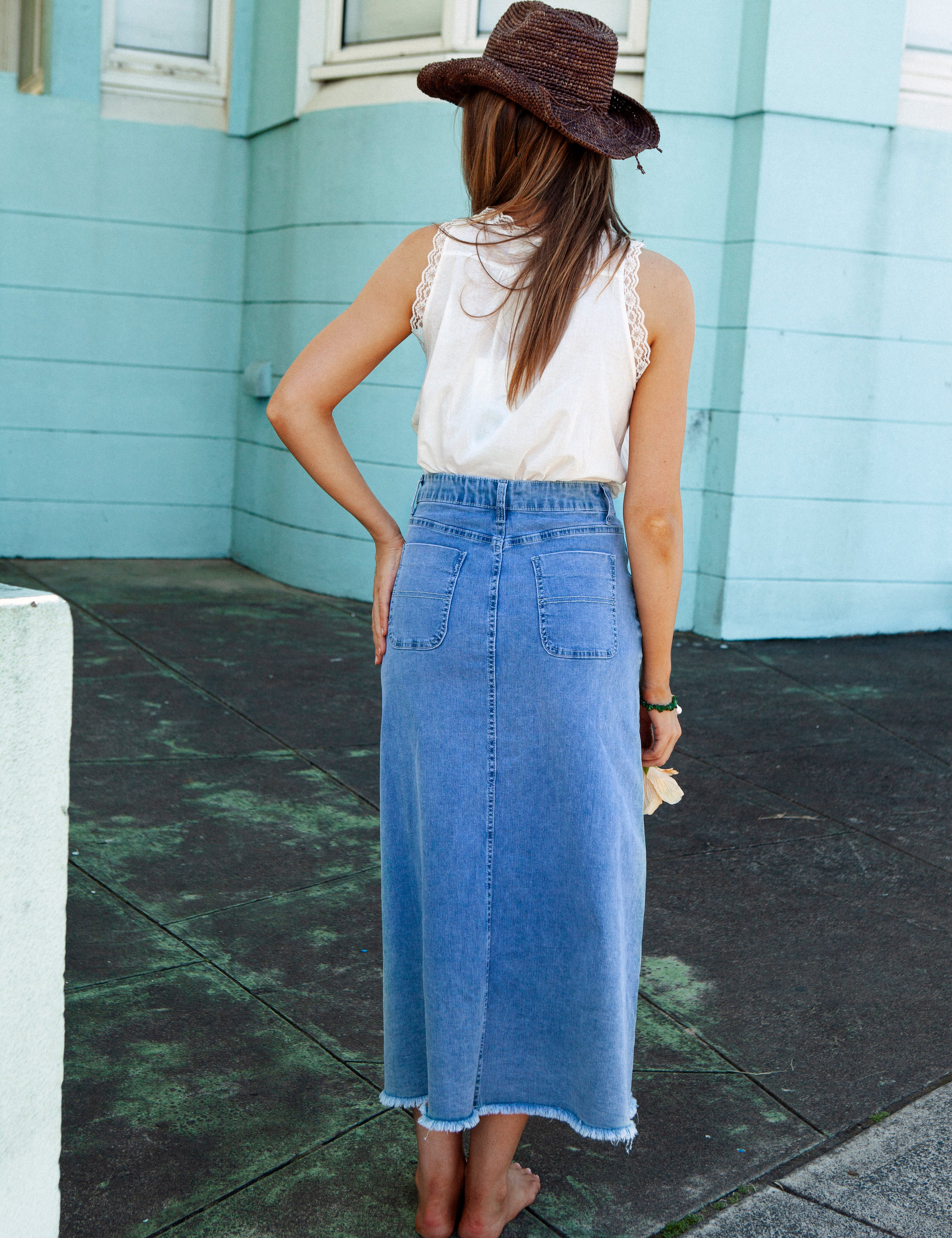 Penny Denim Skirt. Rear View. Mid wash denim.
